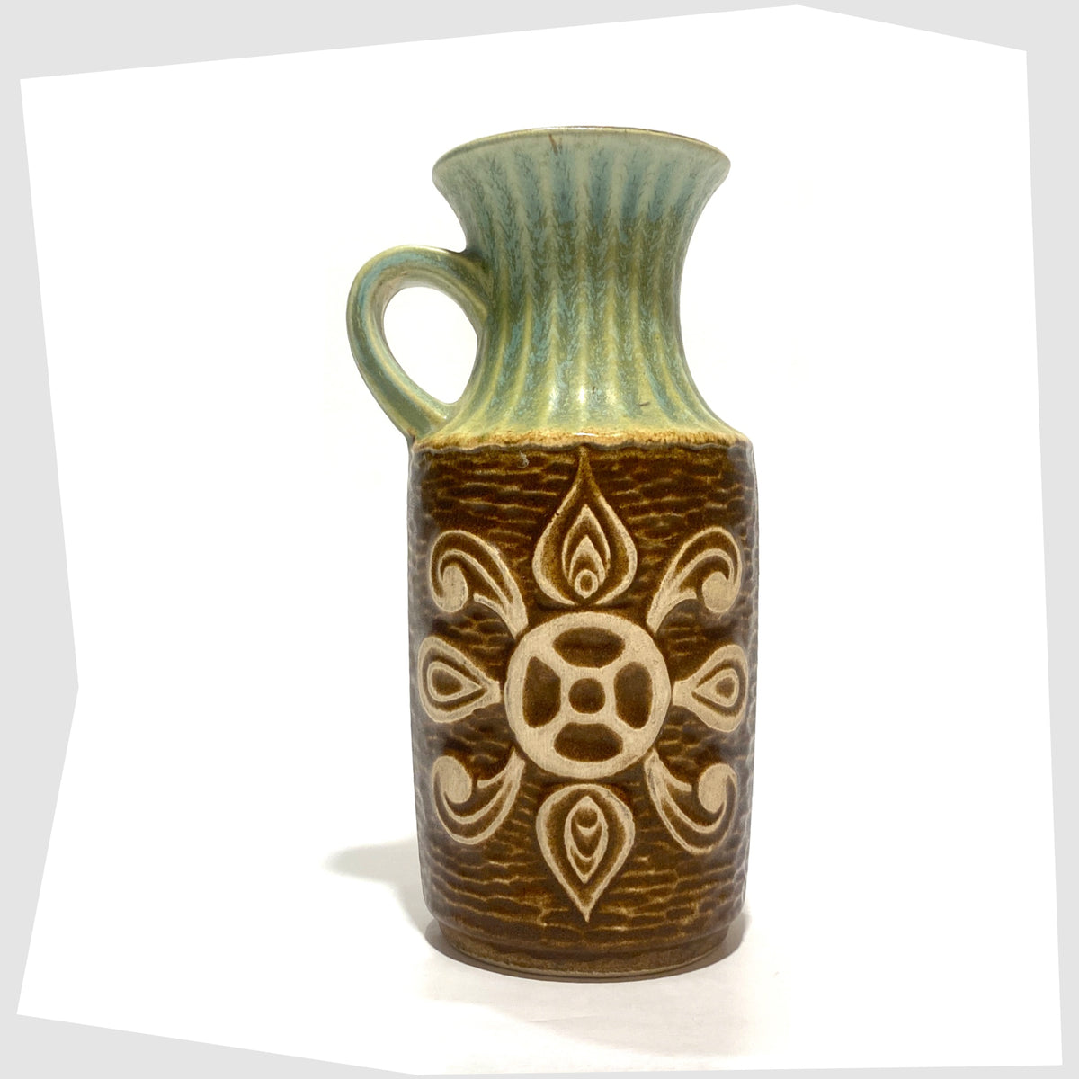 Vintage Bay Keramik 69-20 Vase with a radiating relief design and complimenting green glaze, shown on a white background