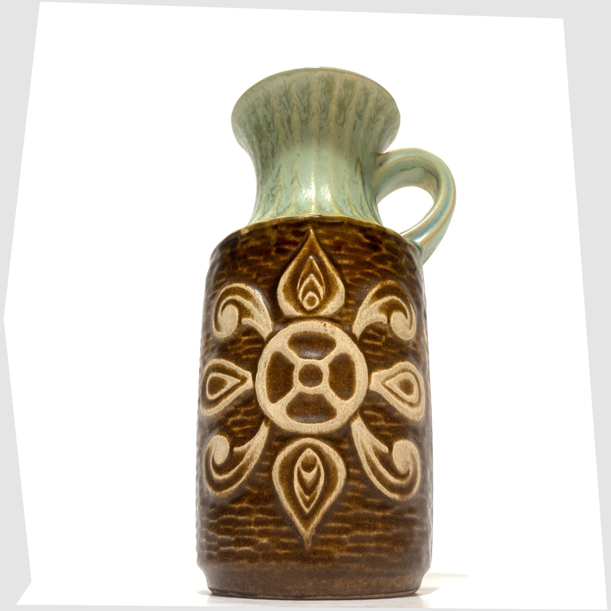 West German Pottery Bay Keramik 69-20 Vase with a radiating relief design and complimenting green glaze, shown on a white background