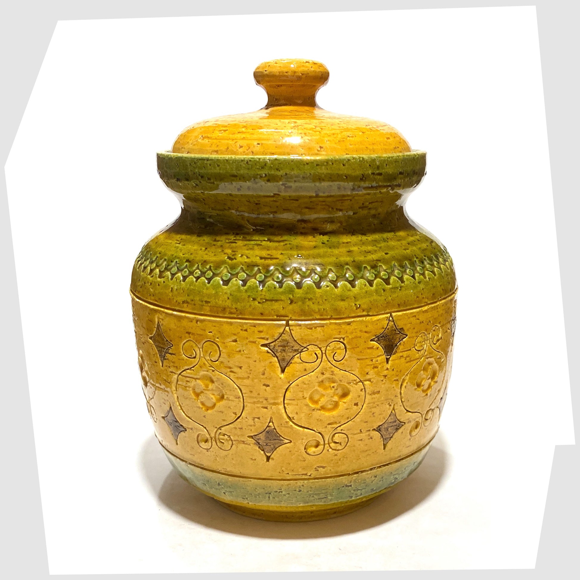 Mid-Century Modern Bitossi Arabesque Lidded Jar in yellow glaze with green bands and impressed markings, shown on a white background