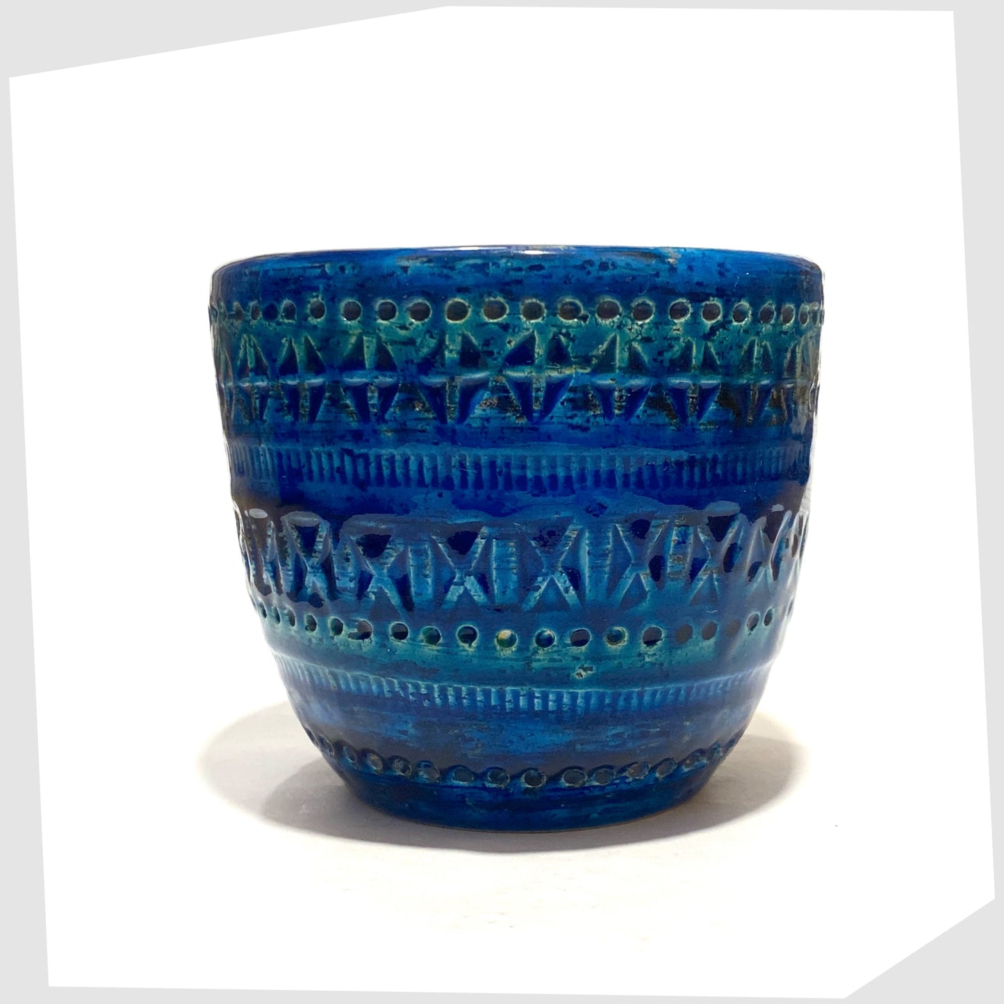 1960s Bitossi Rimini Blue Planter designed by Aldo Londi in a rich blue glaze with an array of impressed markings, shown on a white background