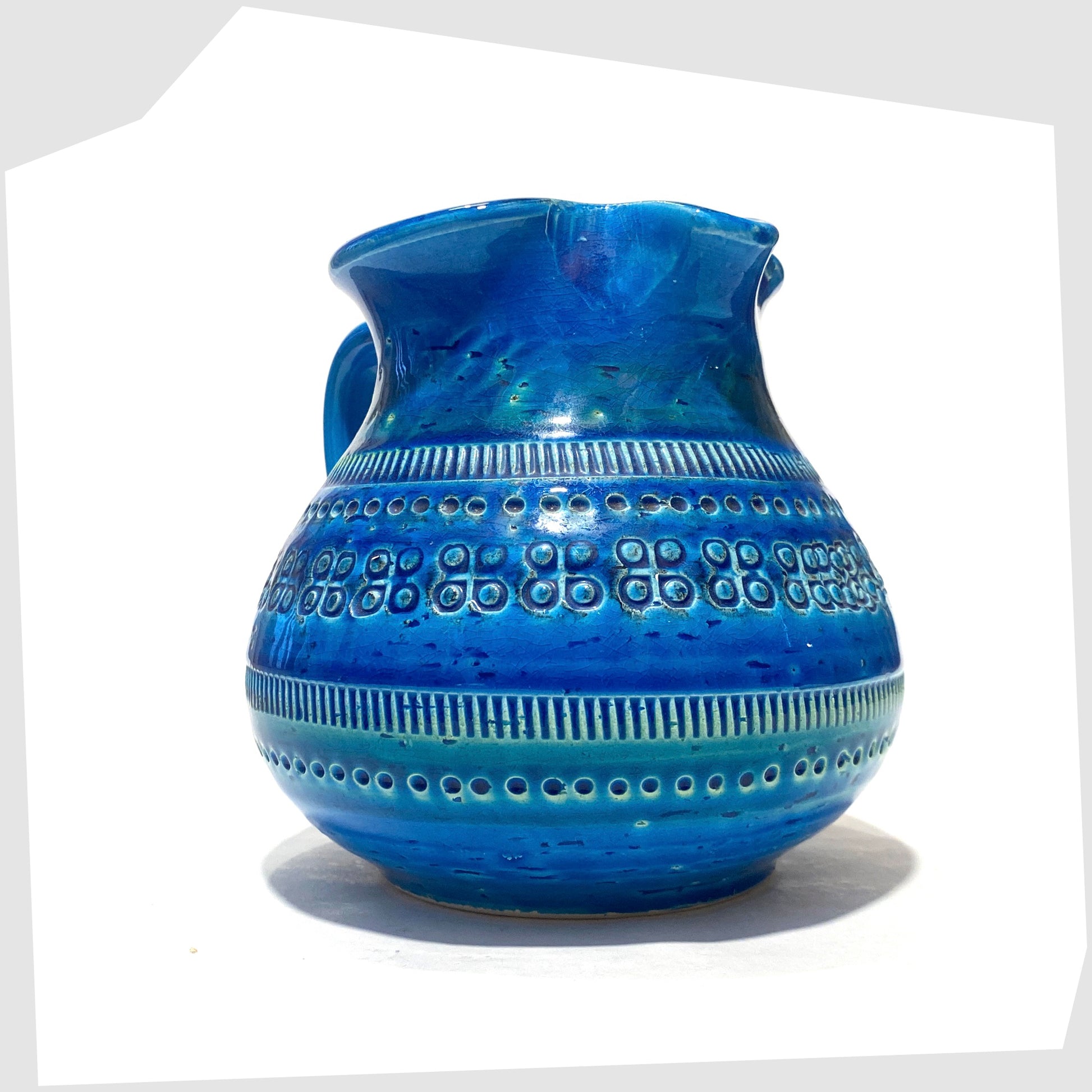Flavia Montelupo/Bitossi Vase with impressed patterns around the main body, shown on a white background
