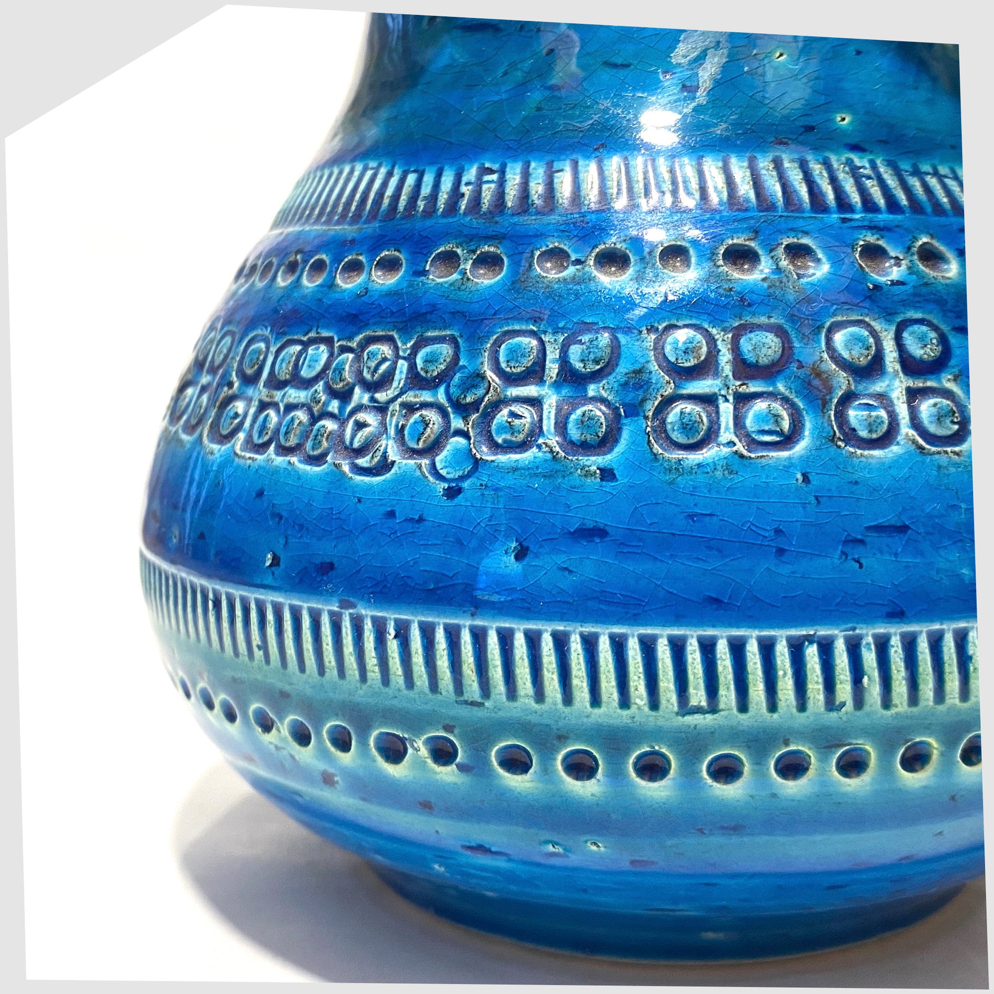 Close up of the Flavia Montelupo/Bitossi Vase in iconic blue glaze with impressed markings, shown on a white background
