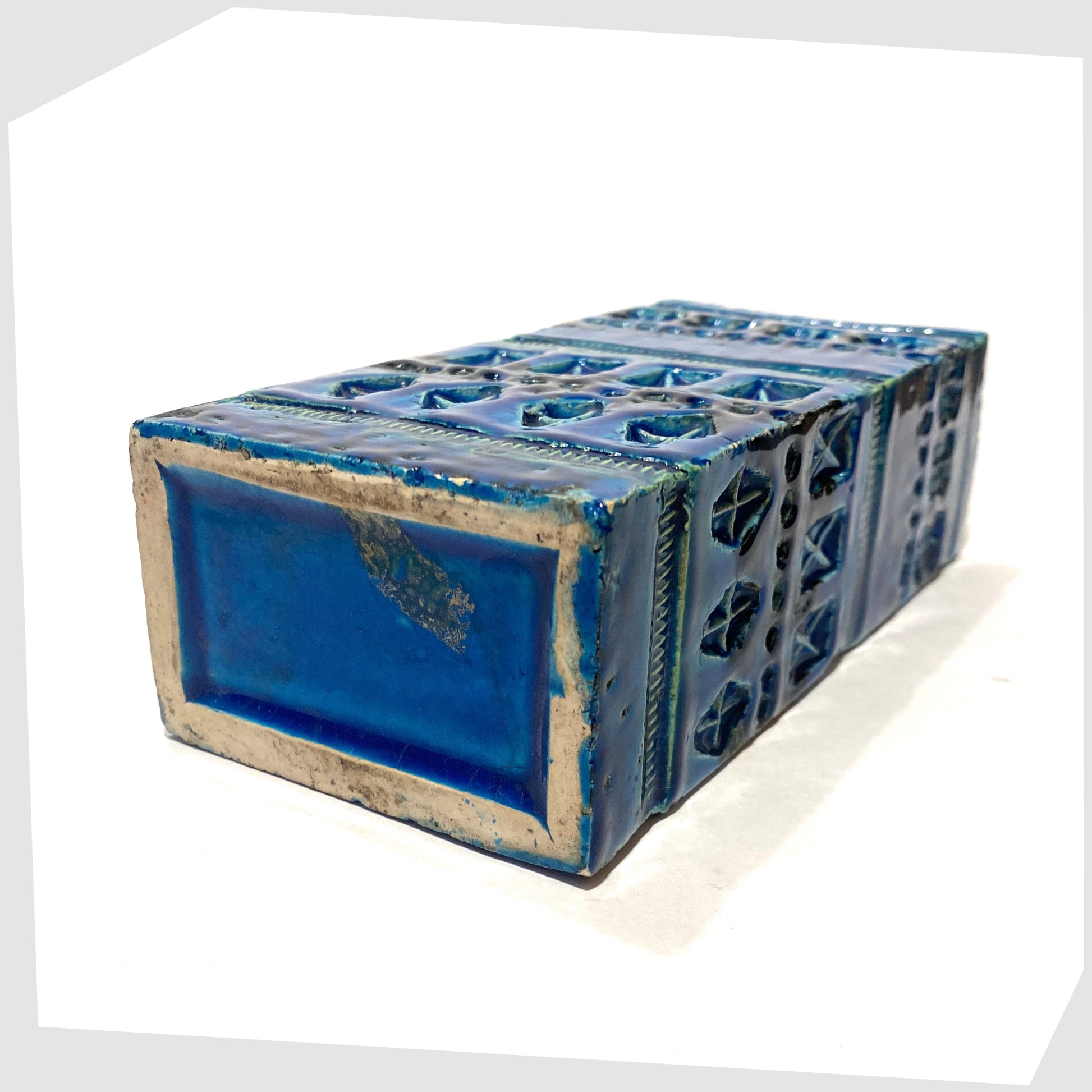 Base of the Bitossi Rimini Blu Brick Vase, designed by Aldo Londi, shown on a white background