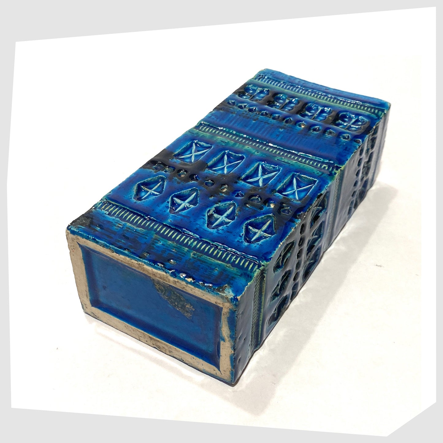 Underneath of the Bitossi Rimini Blu Brick Vase, designed by Aldo Londi, shown on a white background