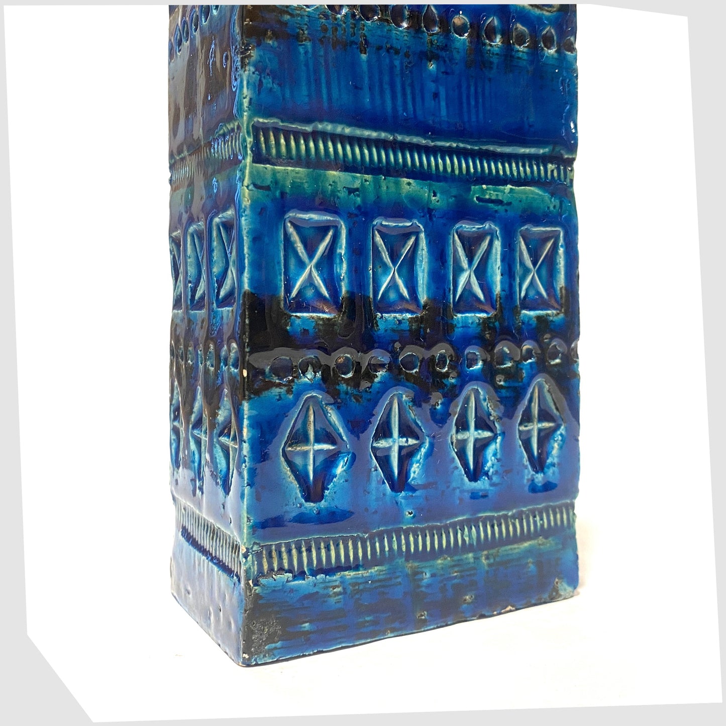 Lower section of the Bitossi Rimini Blu Brick Vase, designed by Aldo Londi, shown on a white background