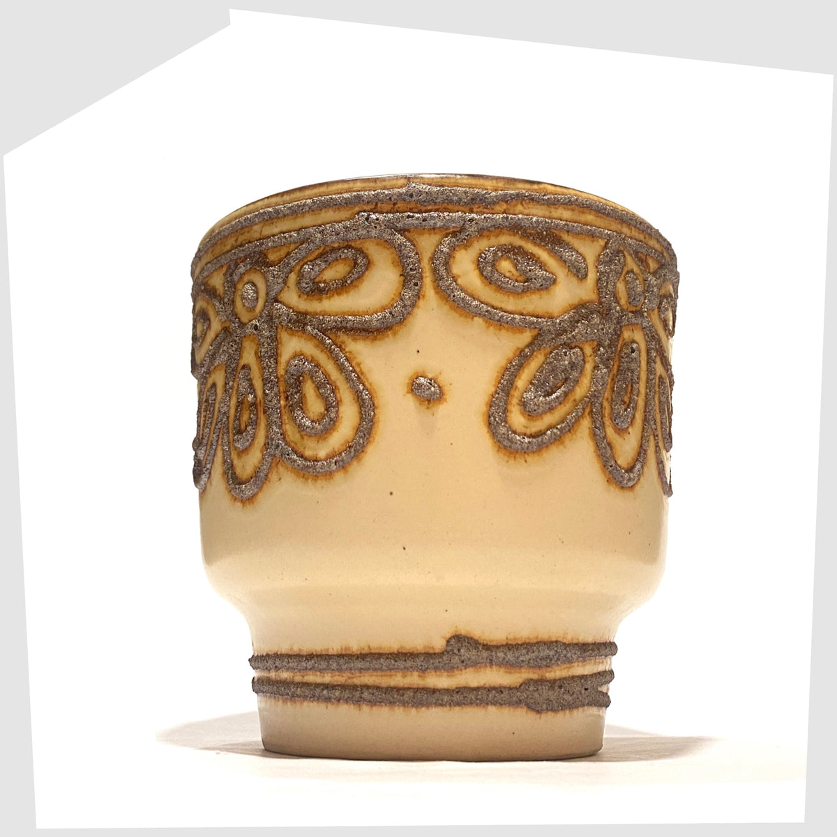Vintage B.P.F. Heffen Planter in a matte beige glaze with brown fat lava design, shown on a white background