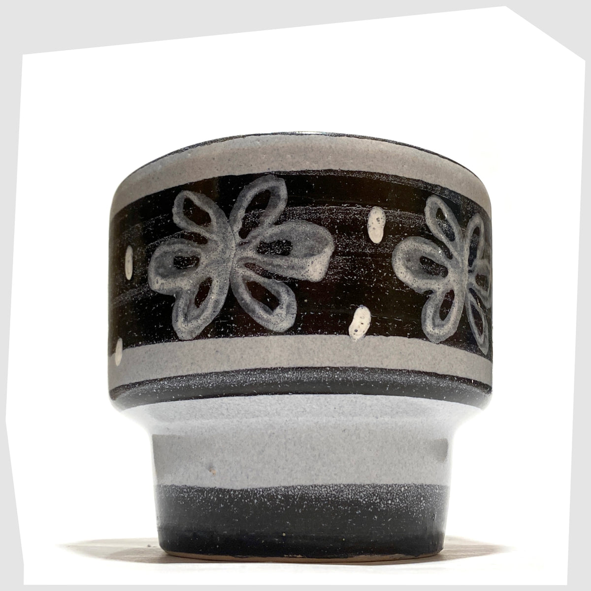 1970s Belgian Pottery Planter by BPF Heffen in a grey/blue glaze with hand-painted band of stylised flowers, shown on a white background