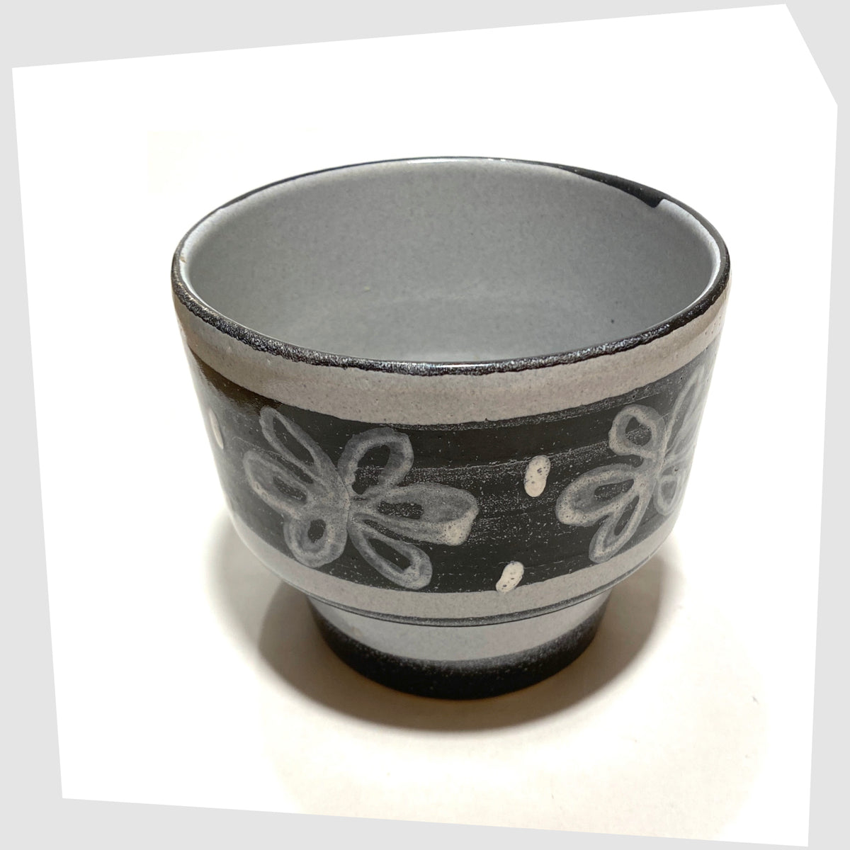 Inside of the Belgian Pottery Planter by BPF Heffen in a grey/blue glaze with hand-painted band of stylised flowers, shown on a white background