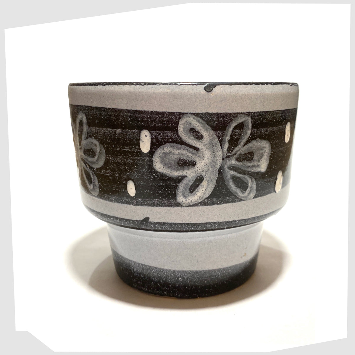 Fat Lava inspired Belgian Pottery Planter by BPF Heffen in a grey/blue glaze with hand-painted band of stylised flowers, shown on a white background
