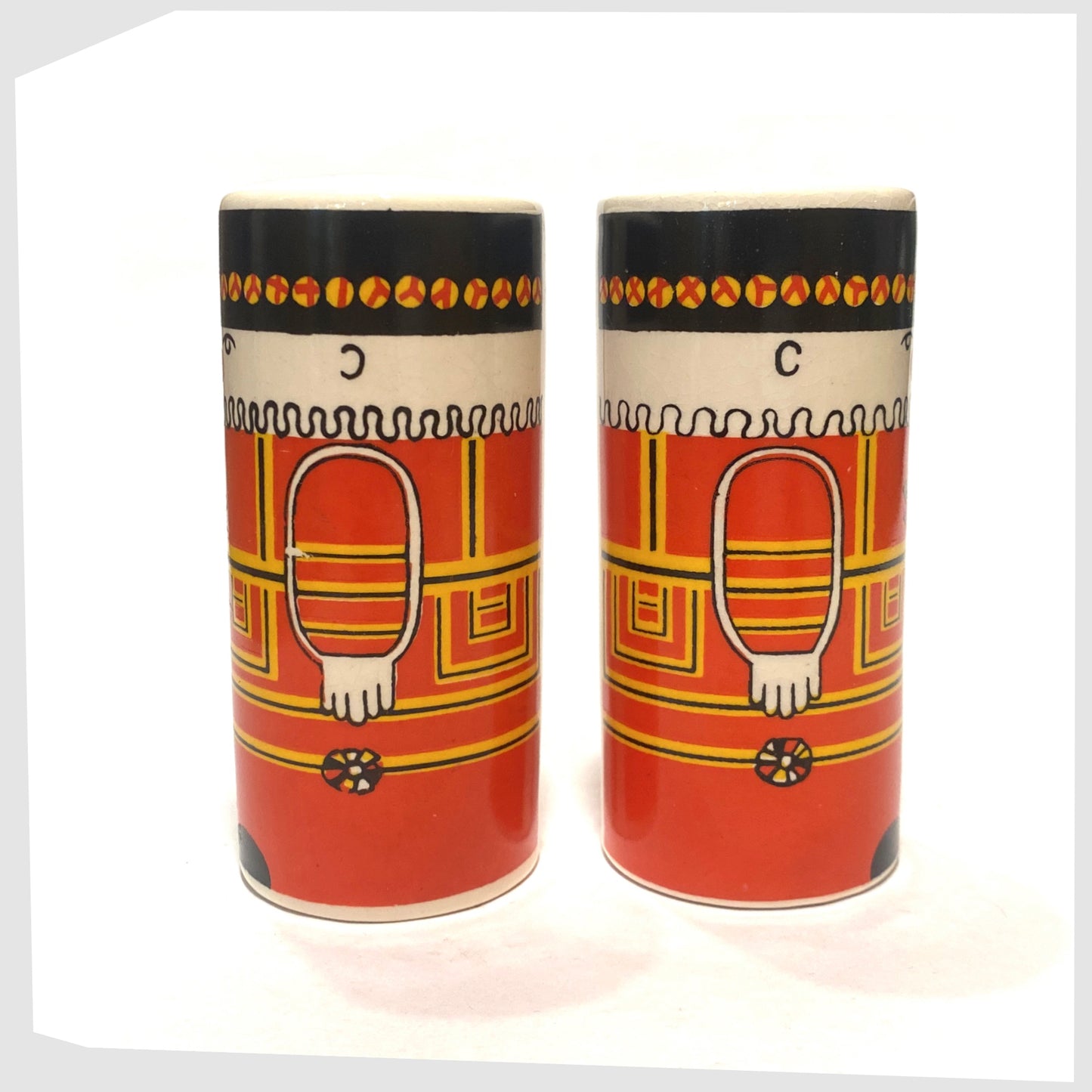 Carlton Ware Salt & Pepper Beefeater Shakers with lithographic design printed on cylindrical ceramic pots, shown on a white background