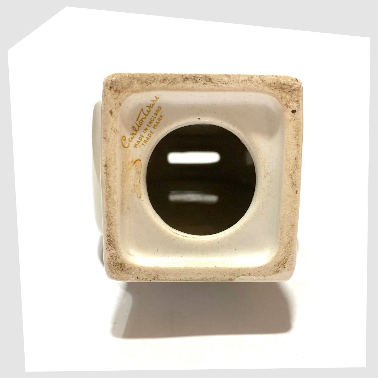 base opening on the Carlton Ware Pirate Money Box, made of ceramic with a printed pirates face