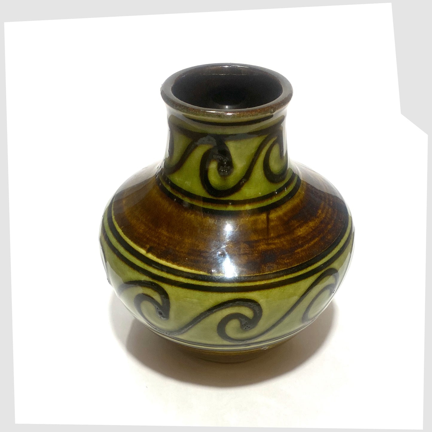 top rim of the carstens-tonnieshof vase, model 6000-15, glazed with bands of apple green and brown