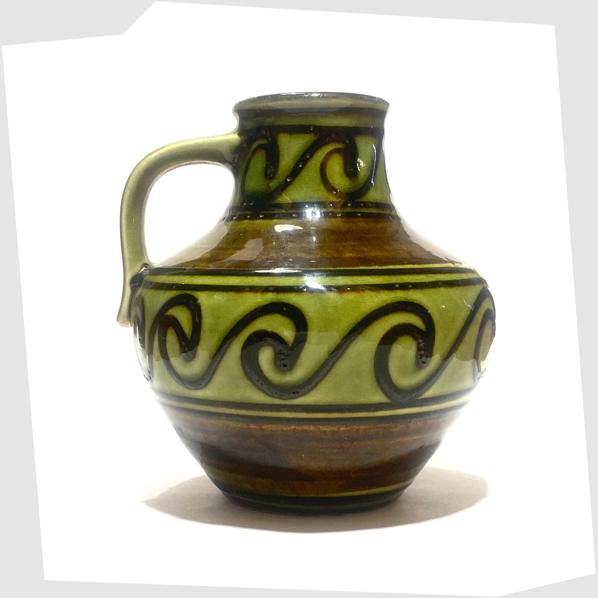 carstens-tonnieshof vase, model 6000-15, glazed with bands of apple green and brown, with a repeating pattern of flowing waves