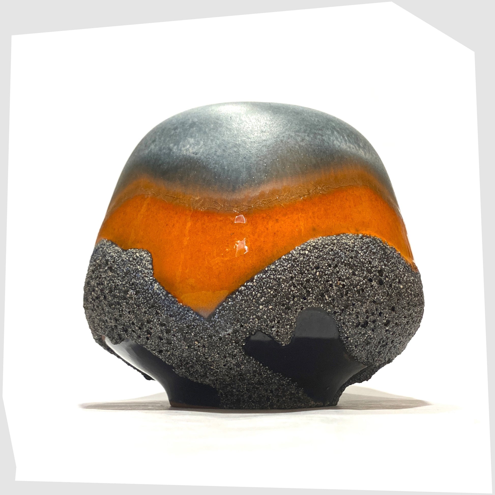 Carsten Tonnieshof Vase in asteroid form with bands of cool grey, volcanic orange and blue fat lava