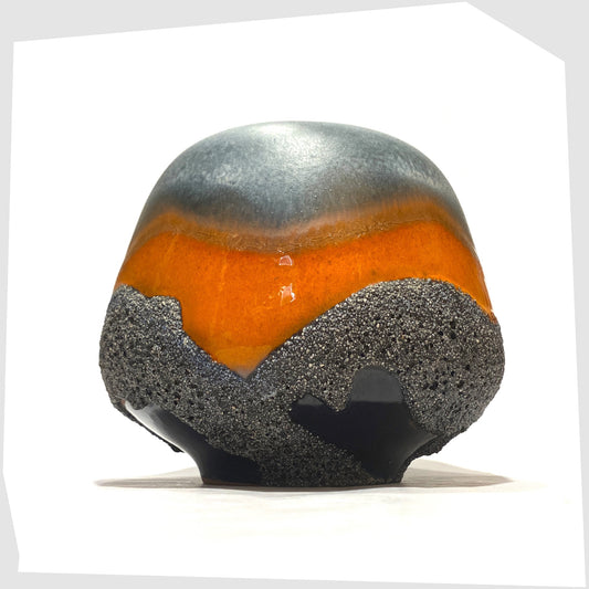 Carsten Tonnieshof Vase in asteroid form with bands of cool grey, volcanic orange and blue fat lava