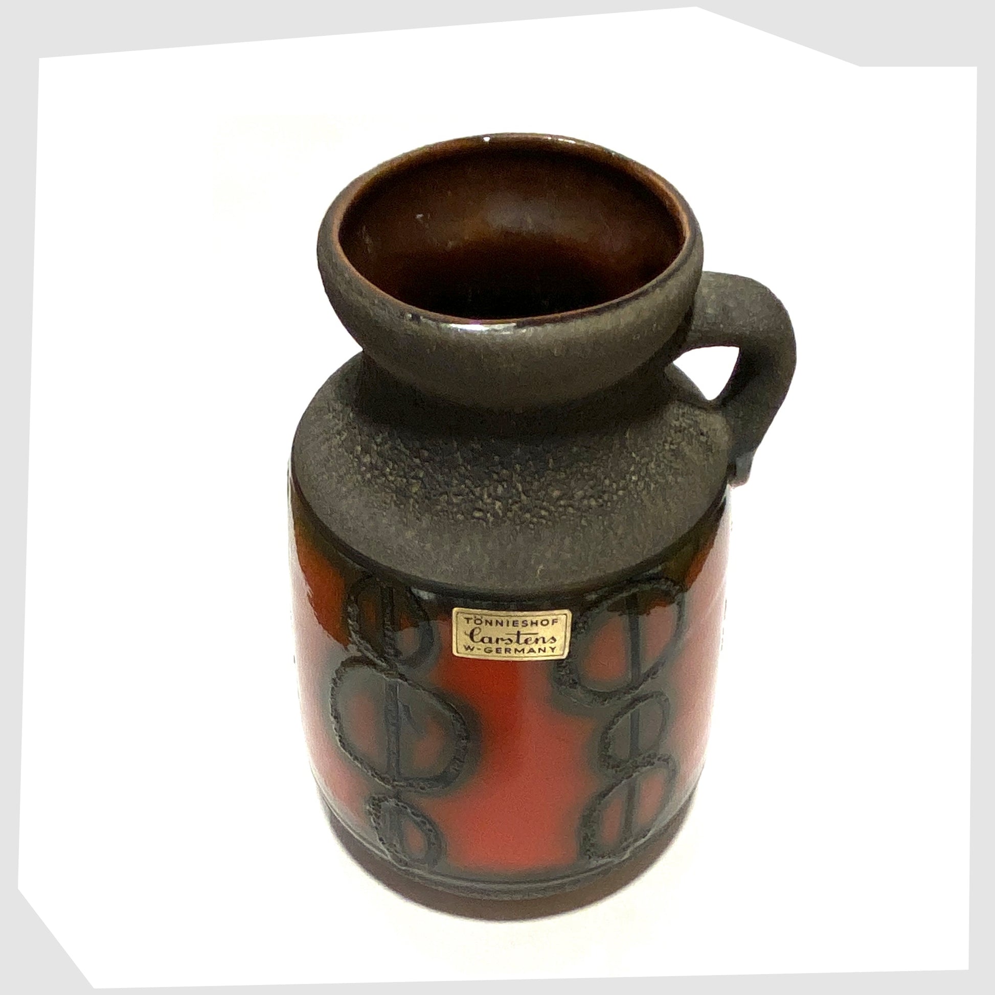 top rim of the Carstens Tonnieshof Vase in matte grey glaze with a central band of red fat lava glaze