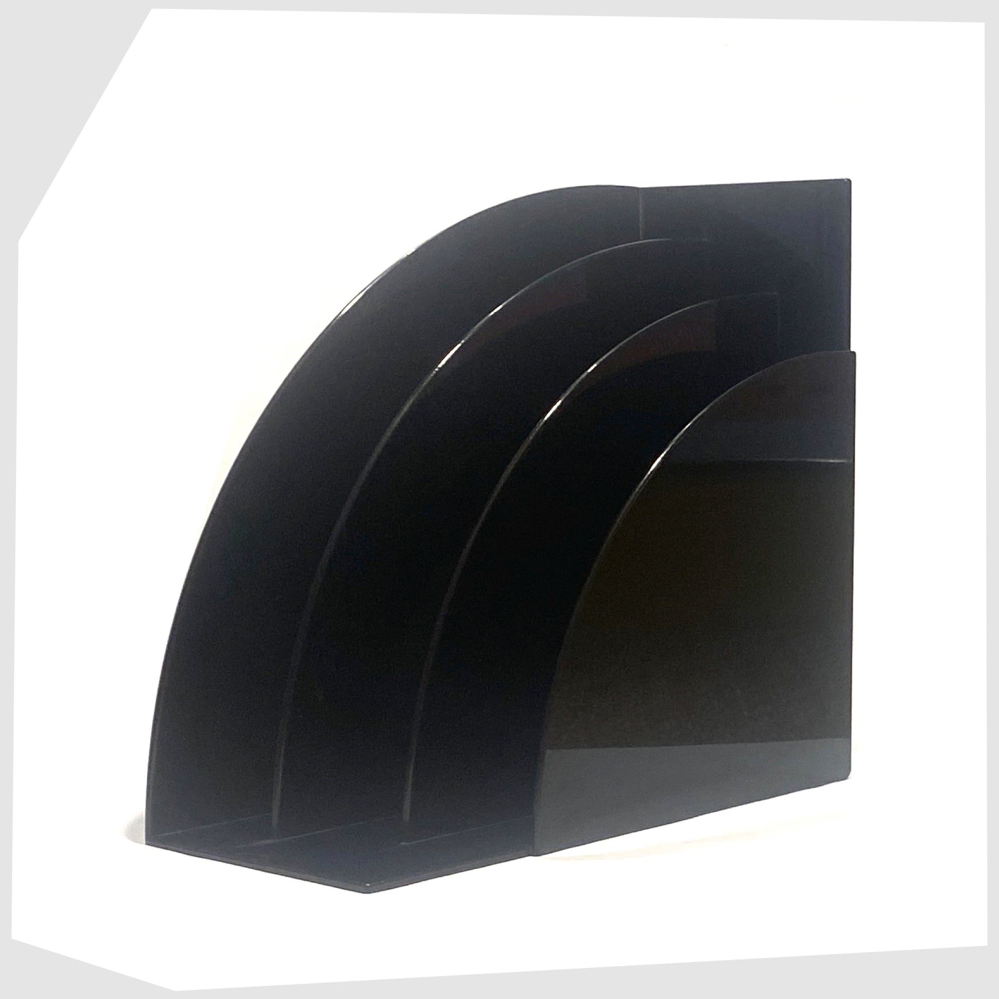 Angled view of the Crayonne Record Rack in Black, designed by Terrance Conran for Habitat's 1970s plastic collection, shown on a white background