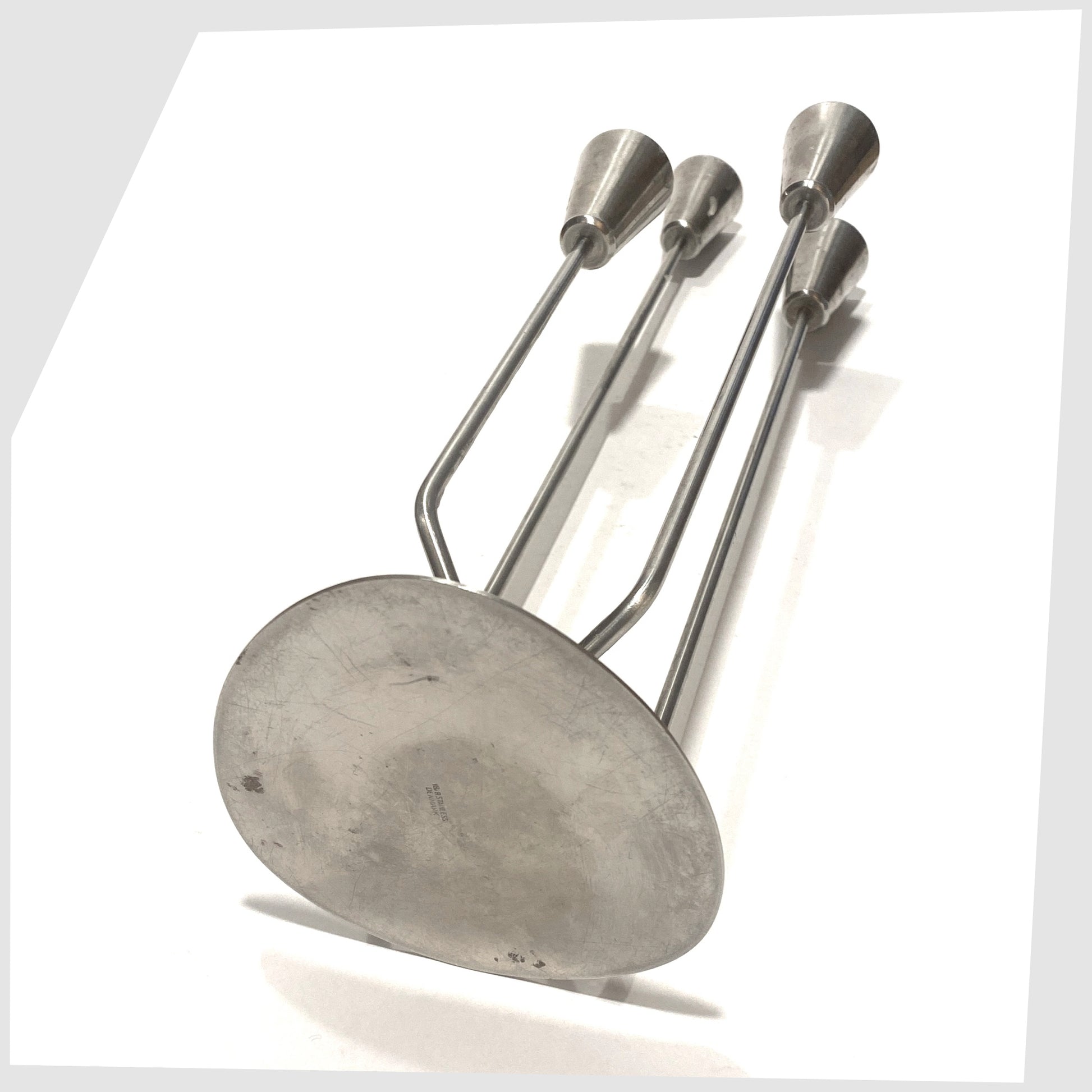 underneath of the Danish Candlestick Holder by MG Design, made of polished stainless steel