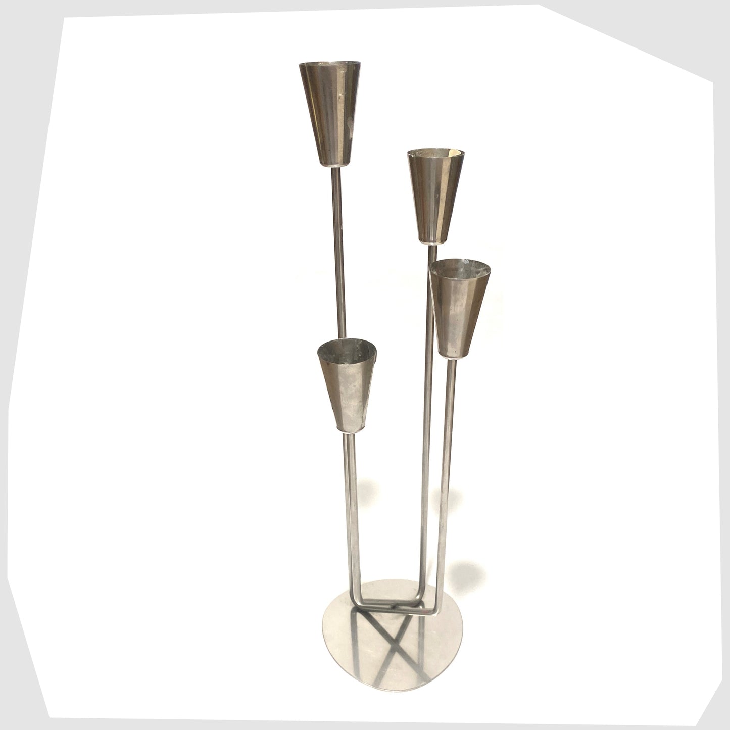 Danish Candlestick Holder by MG Design, made of polished stainless steel, suitable for four taper candles