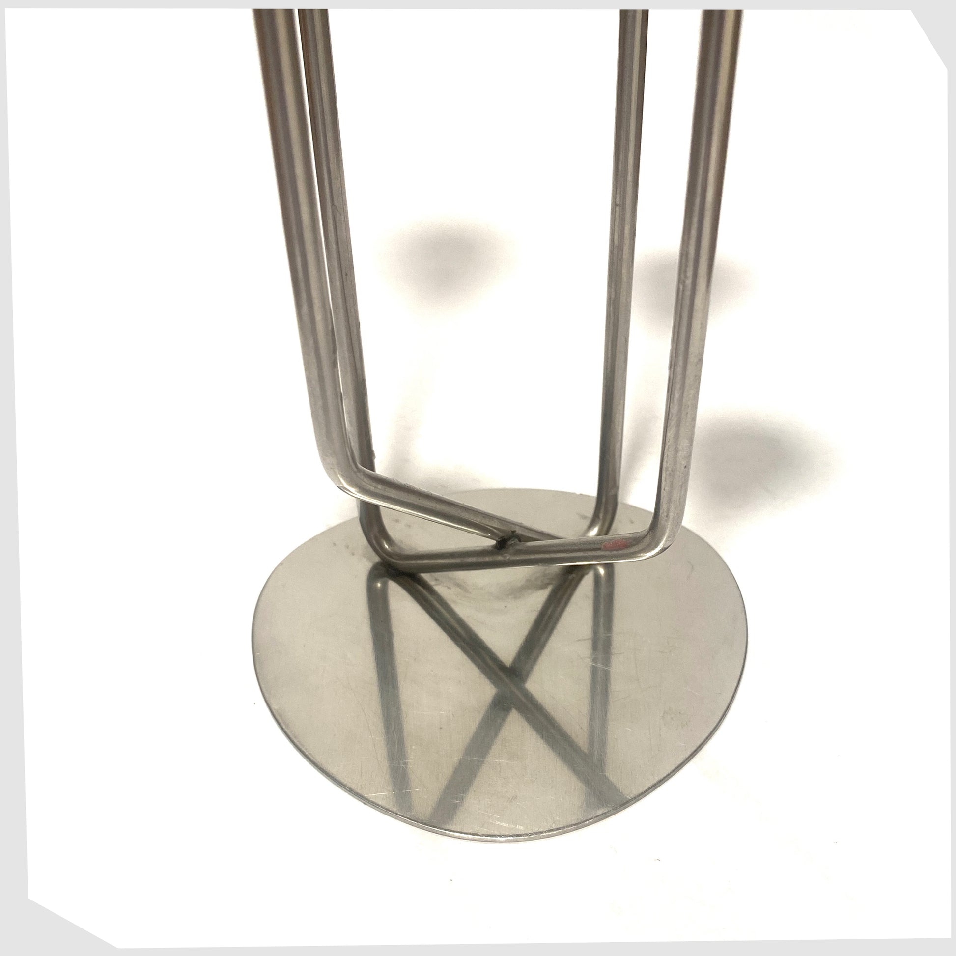base of the Danish Candlestick Holder by MG Design, made of polished stainless steel