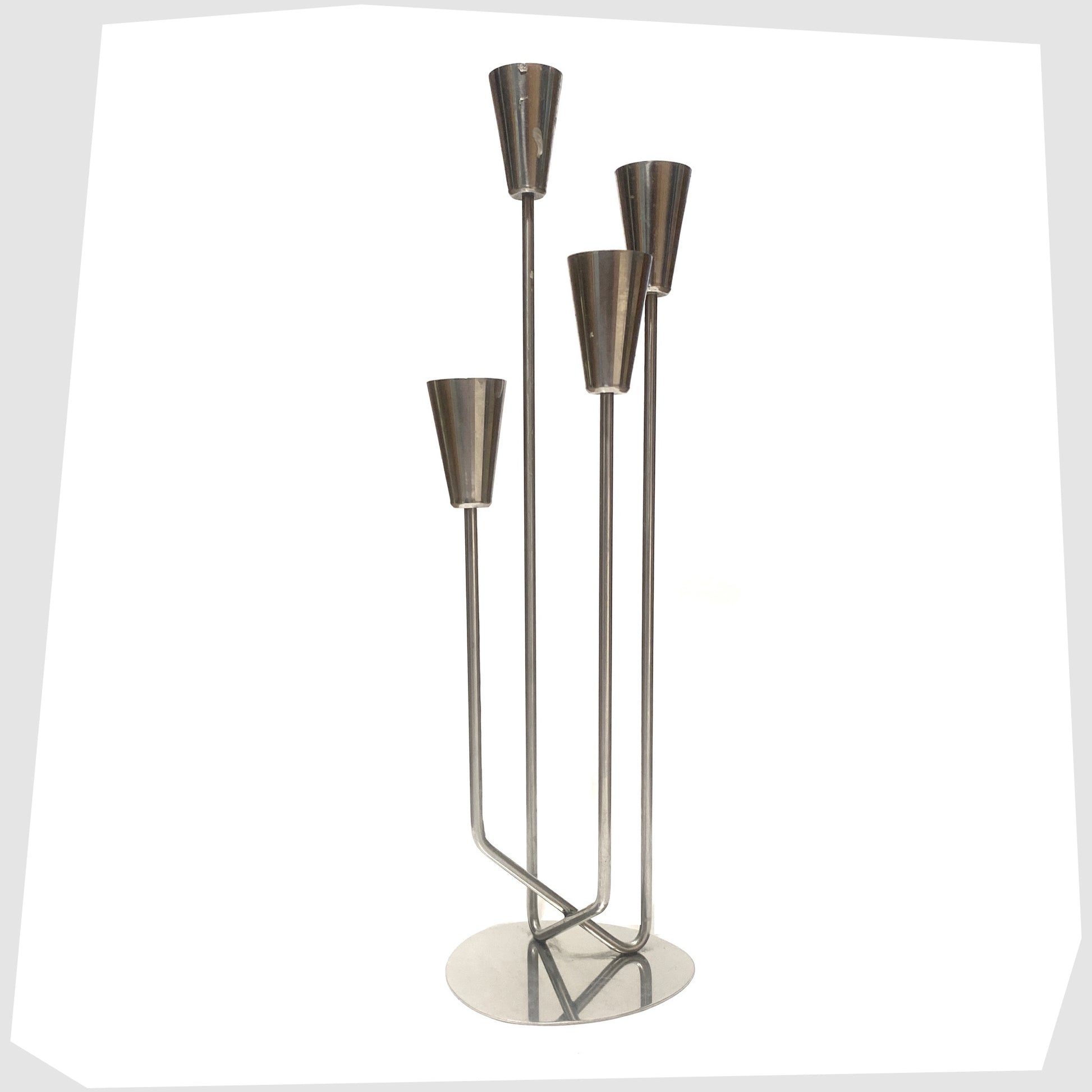 Danish Candlestick Holder by MG Design, made of polished stainless steel