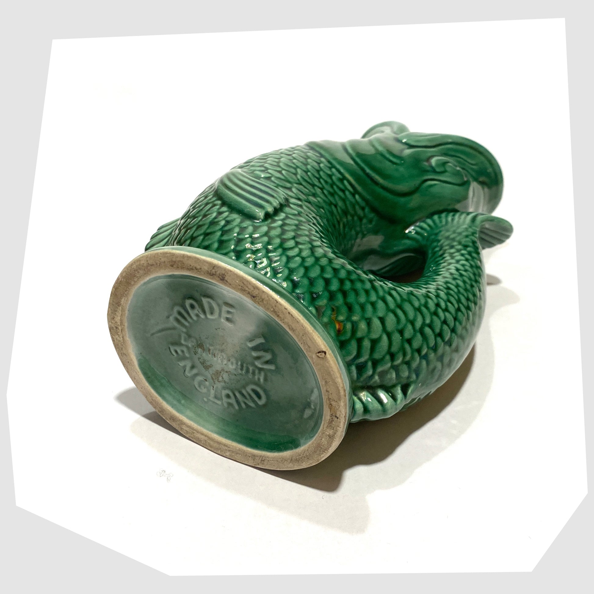 base stamp of the Dartmouth Pottery Gluggle Jug in the iconic green colour wayamp of the