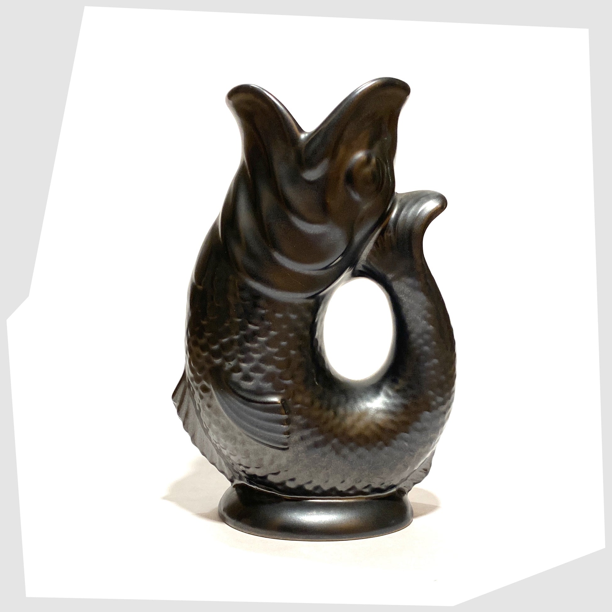 original 1960s dartmouth pottery gluggle jug in matte black glaze