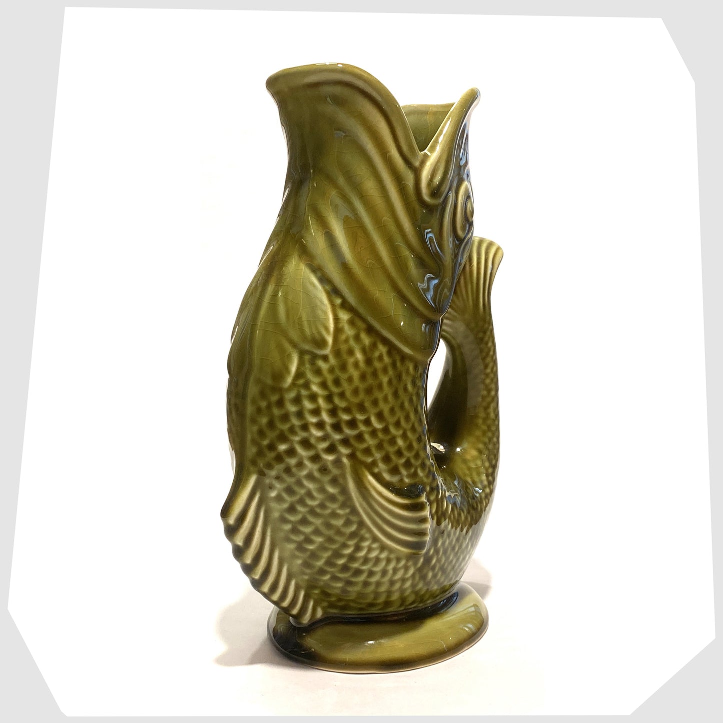 front of the Dartmouth Pottery Gluggle Jug in khaki green glaze