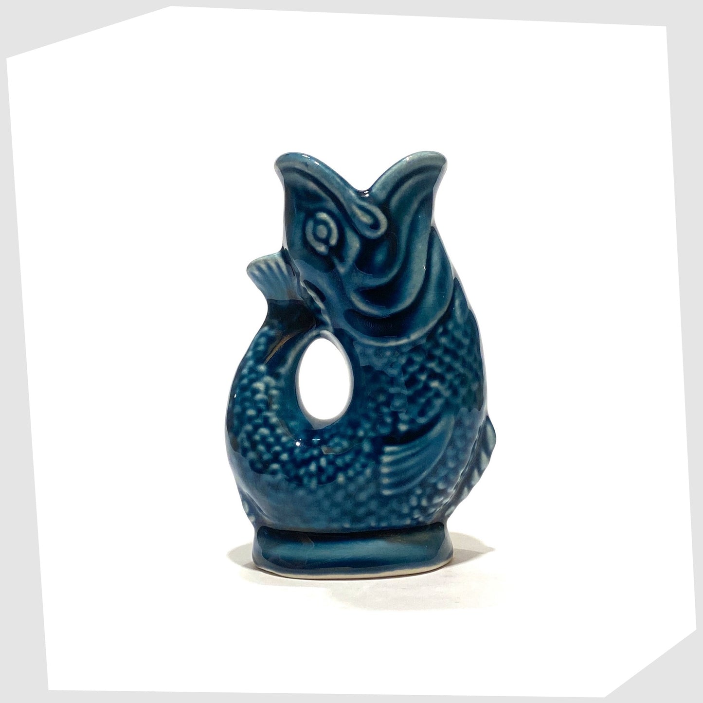 vintage miniature Dartmouth Pottery Gluggle Jug finished in a teal blue glaze