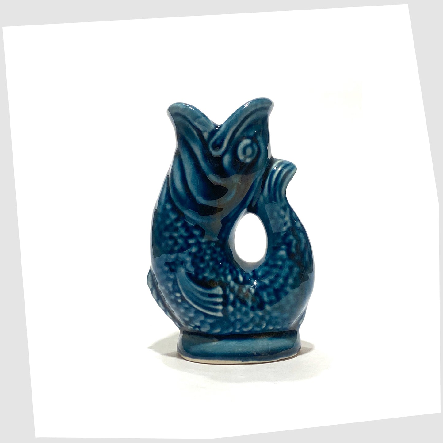 vintage miniature Dartmouth Pottery Gluggle Jug finished in an all-over teal glaze