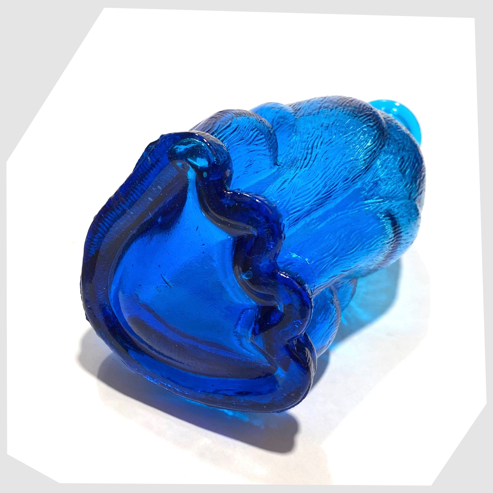 underneath of the Empoli Art Glass Cat-Shaped Decorative Bottle in rich blue glass