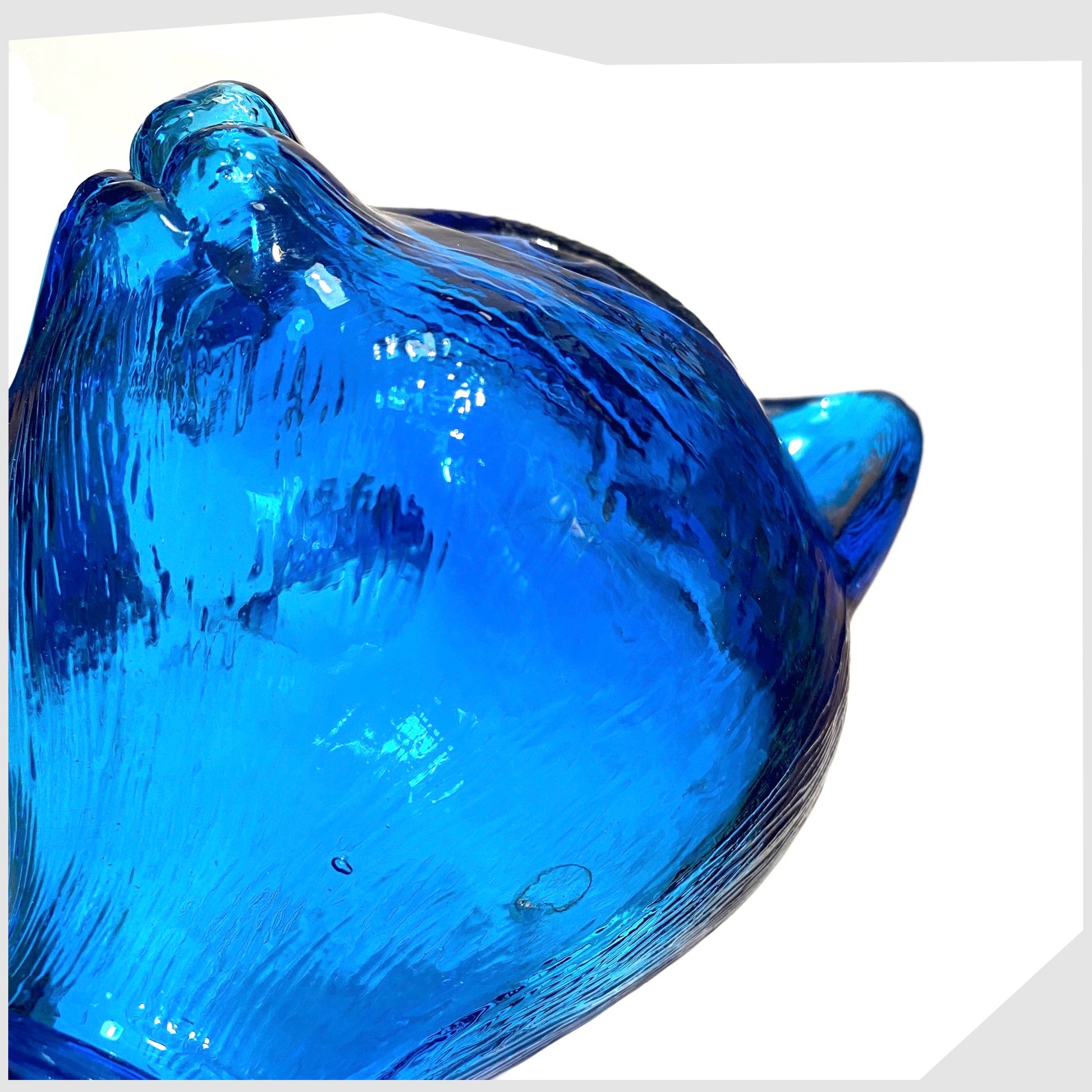 close up of the Empoli Art Glass Cat-Shaped Decorative Bottle in rich blue glass