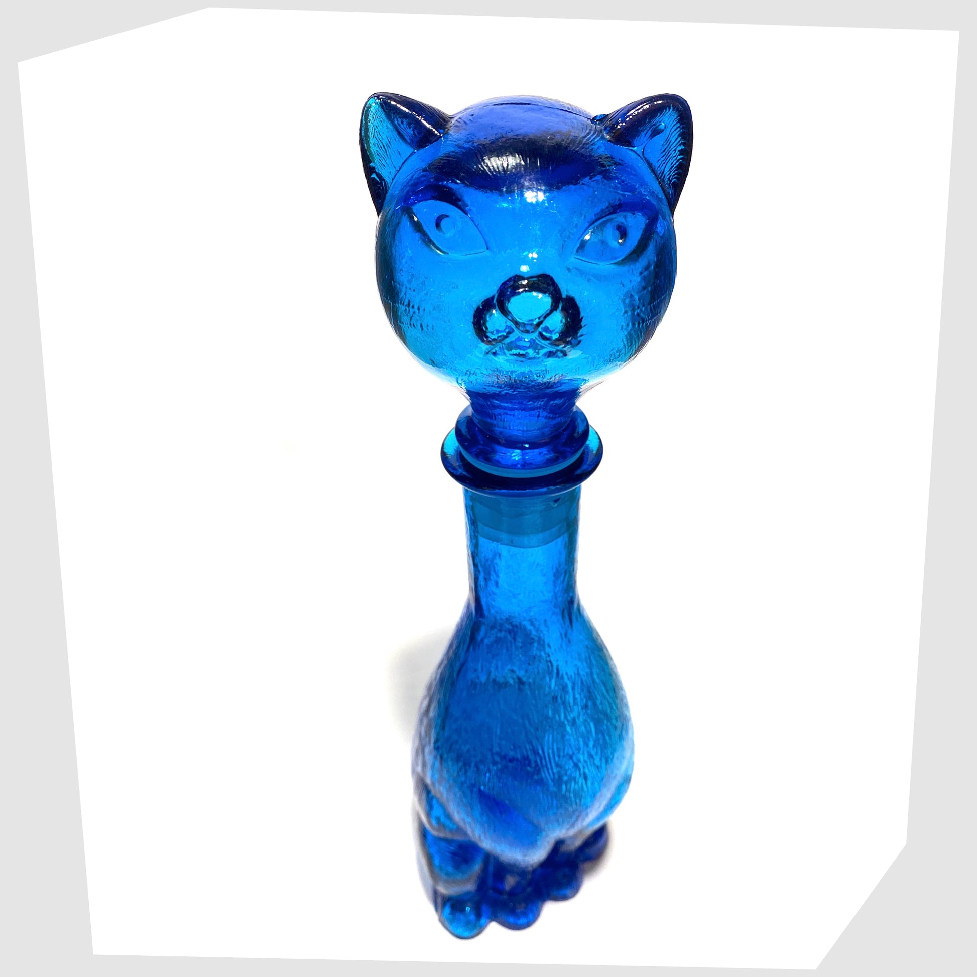 top of the Empoli Cat-Shaped Decorative Bottle in rich blue glass