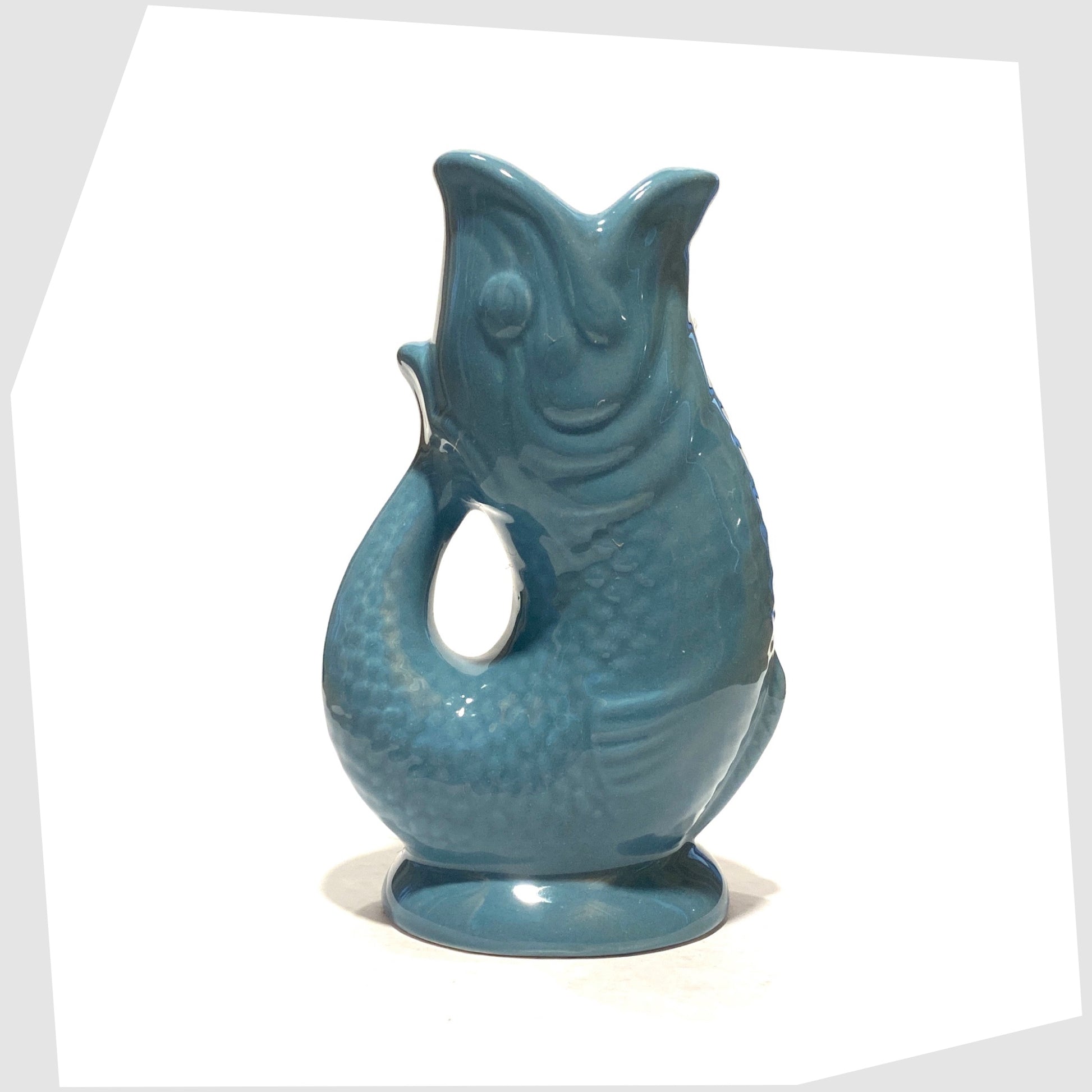 fish-shaped ceramic vase in blue by Rex London