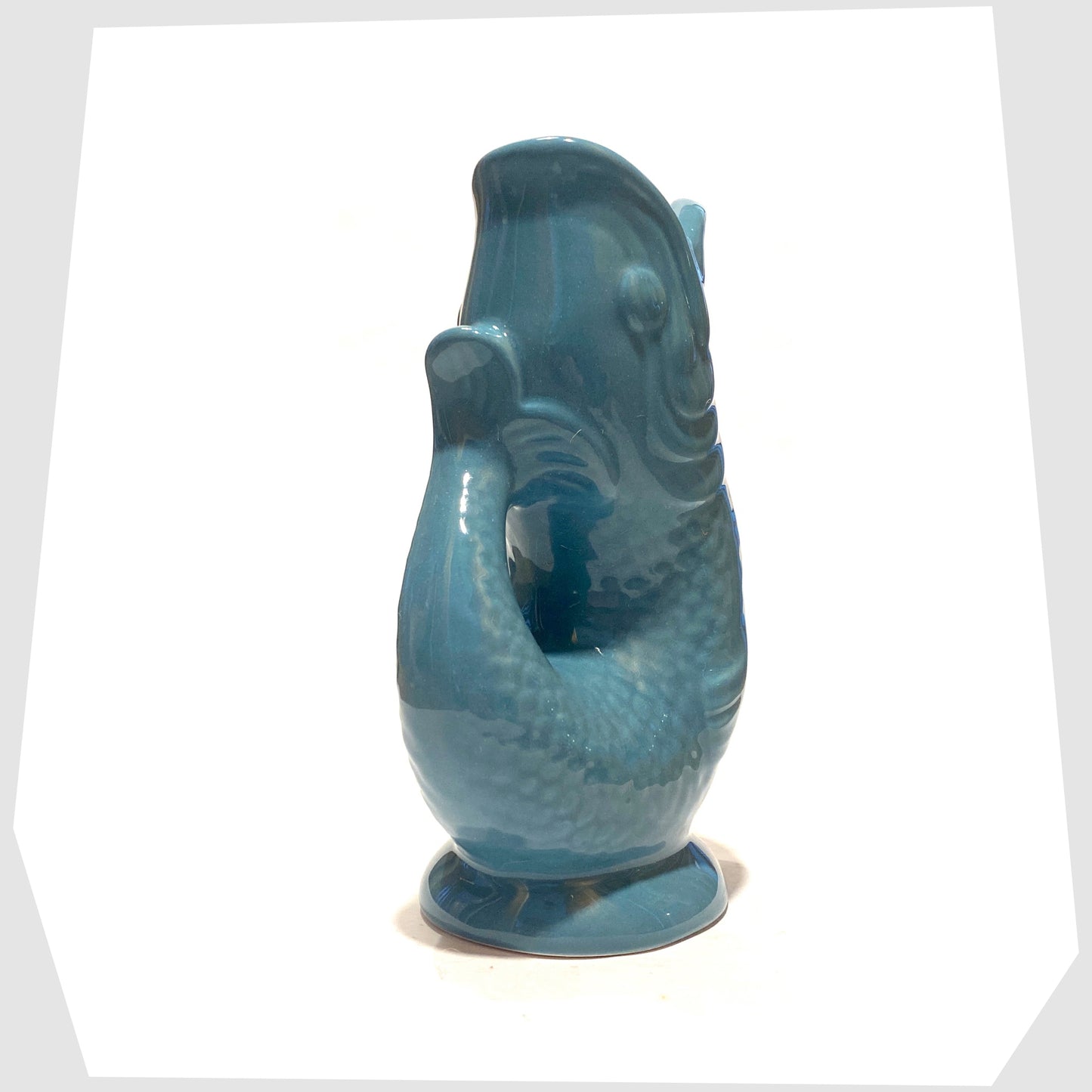 tail of the fish-shaped ceramic vase in blue 