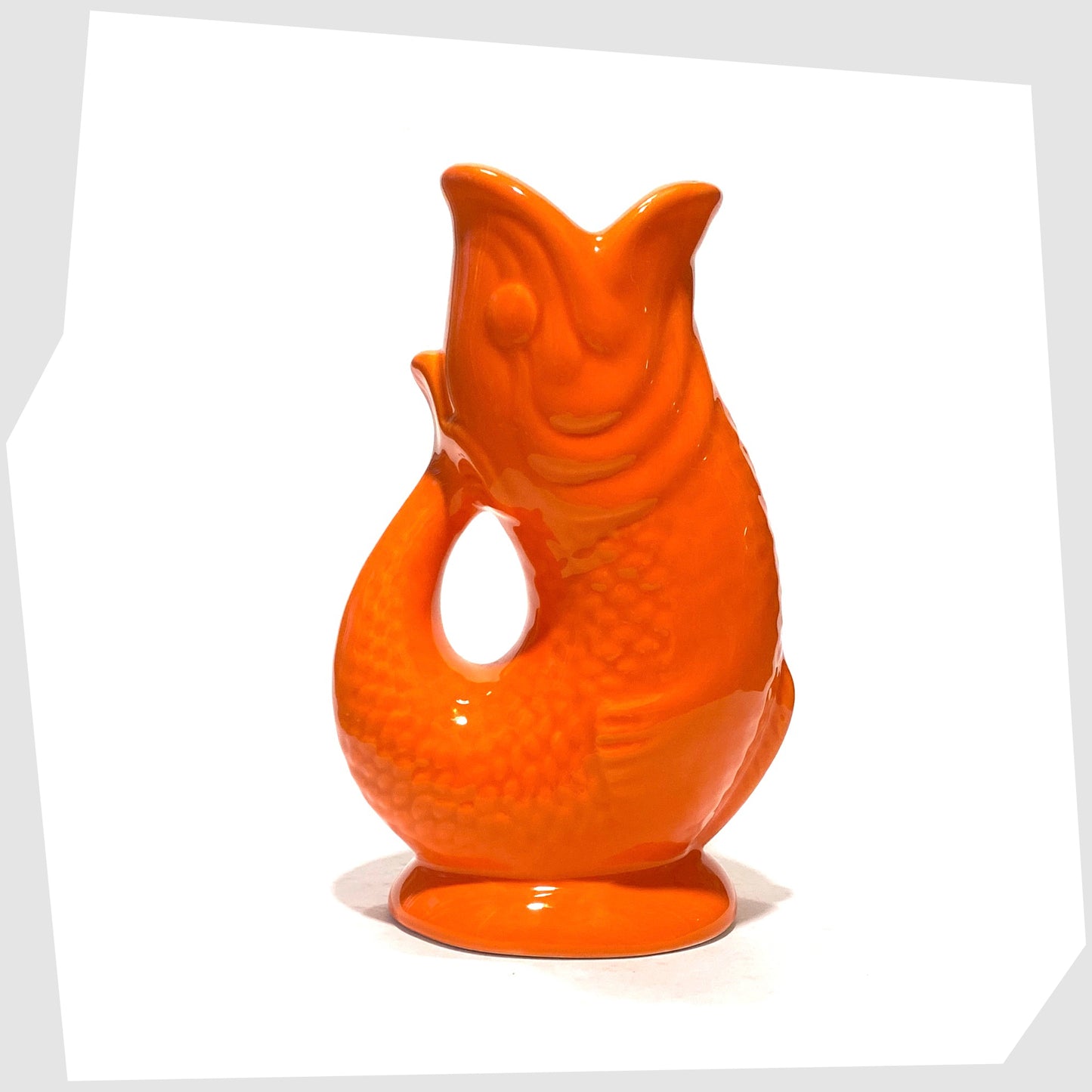 gluggle jug inspired fish-shaped ceramic vase in bold orange glaze 