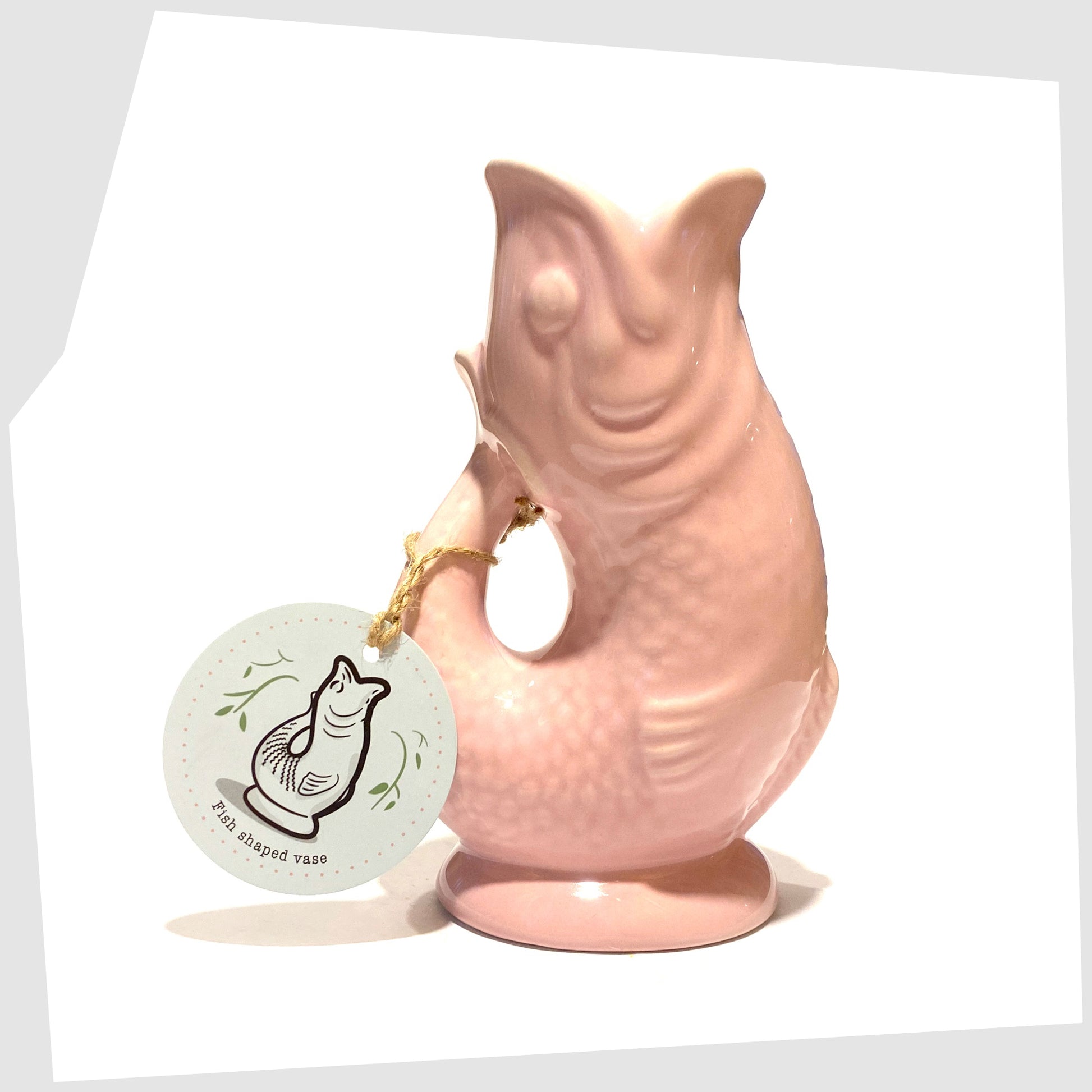 Fish-Shaped Ceramic Vase in pink glaze shown with its printed card tag