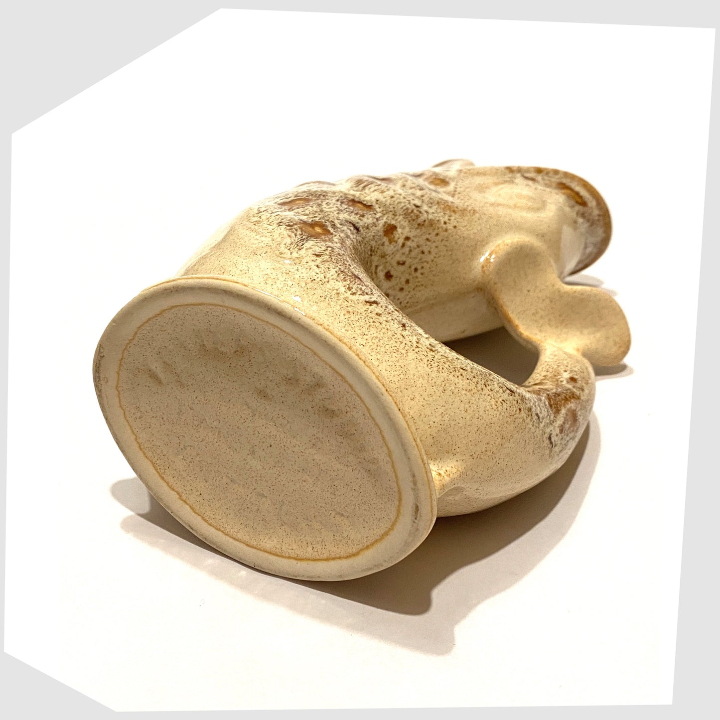 base stamp of the fosters studio pottery gluggle jug in cream and brown honeycomb glaze