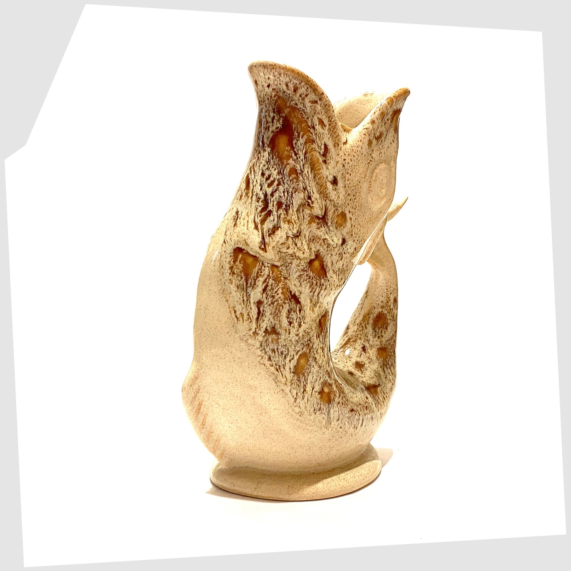 front of the fosters studio pottery gluggle jug in honeycomb glaze of cream and brown