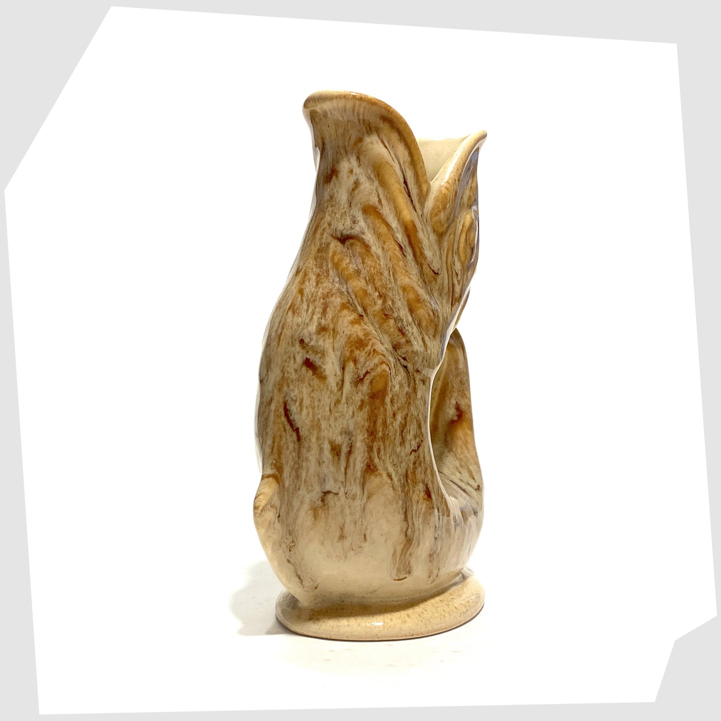 front of the fosters studio pottery gluggle jug in honeycomb glaze of cream and brown