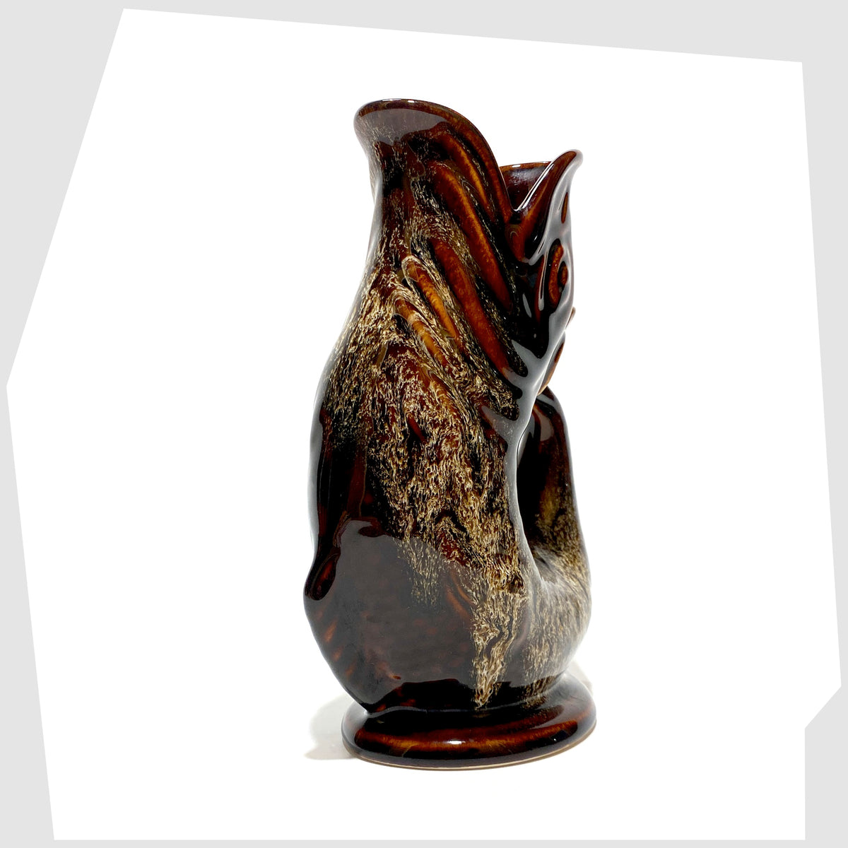 Front of the Fosters Studio Pottery Gluggle Jug in a chestnut brown with amber drip glaze, shown on a white background
