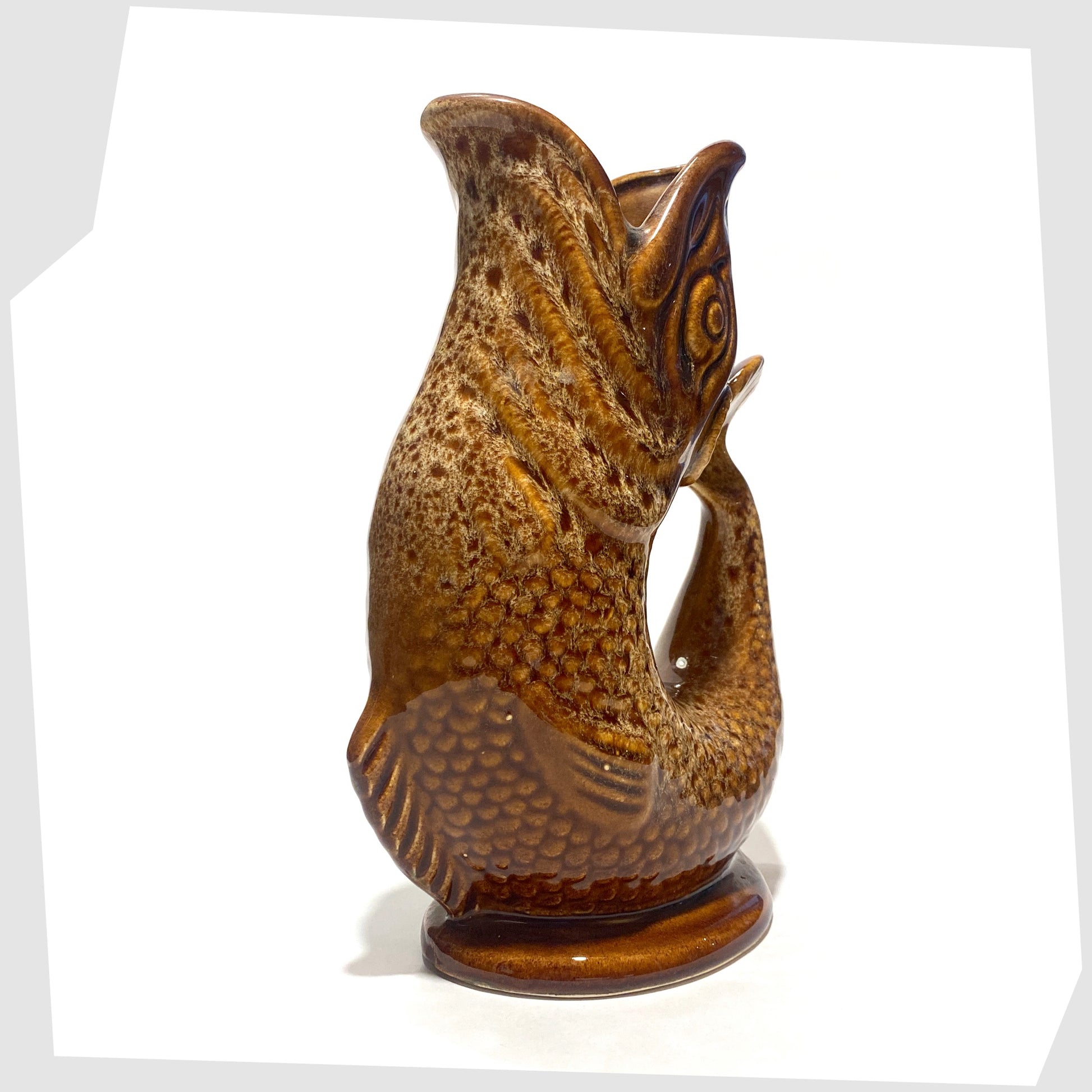 Front of the Fosters Studio Pottery Gluggle Jug in brown and amber honeycomb glaze