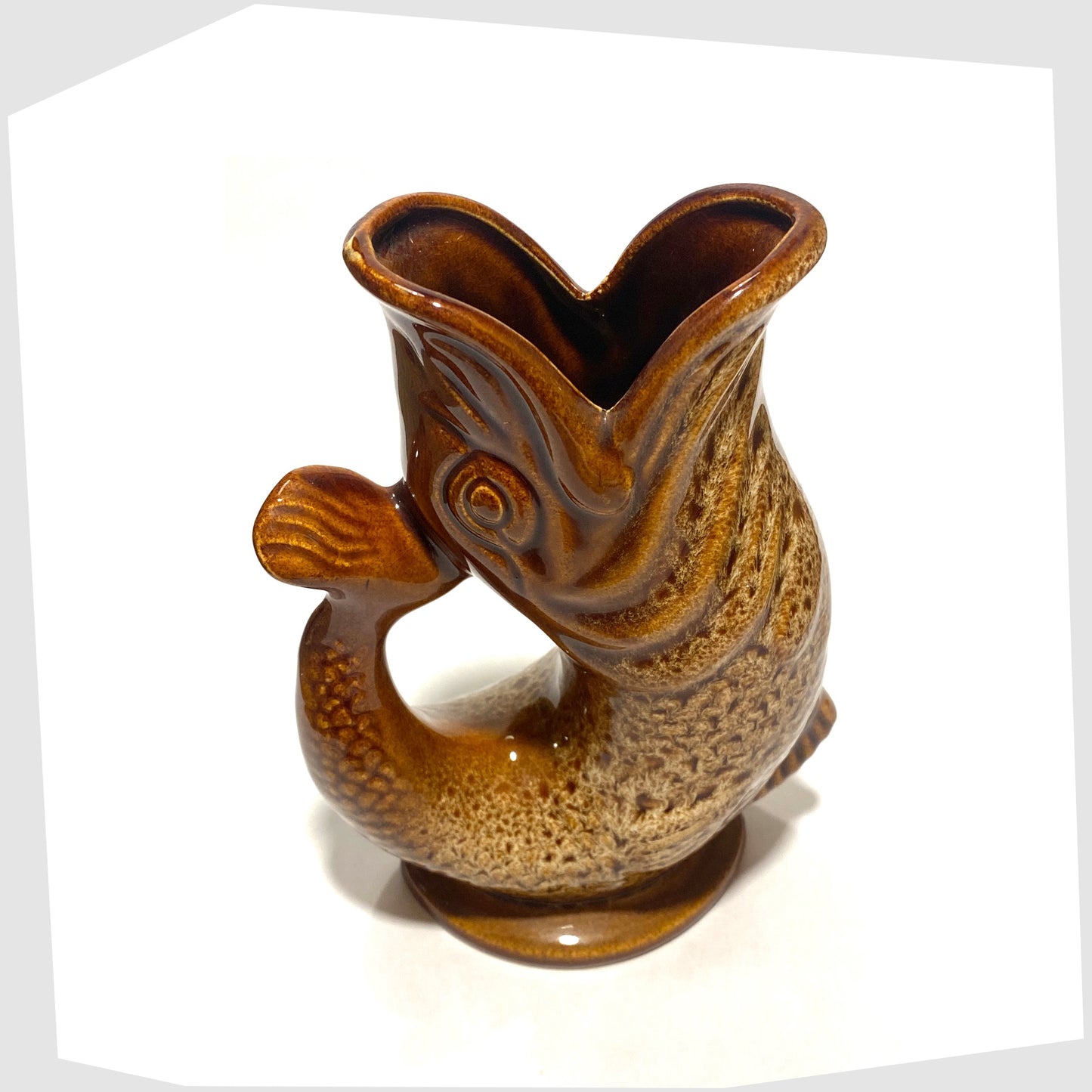 top spout of the Fosters Studio Pottery Gluggle Jug in brown and amber honeycomb glaze