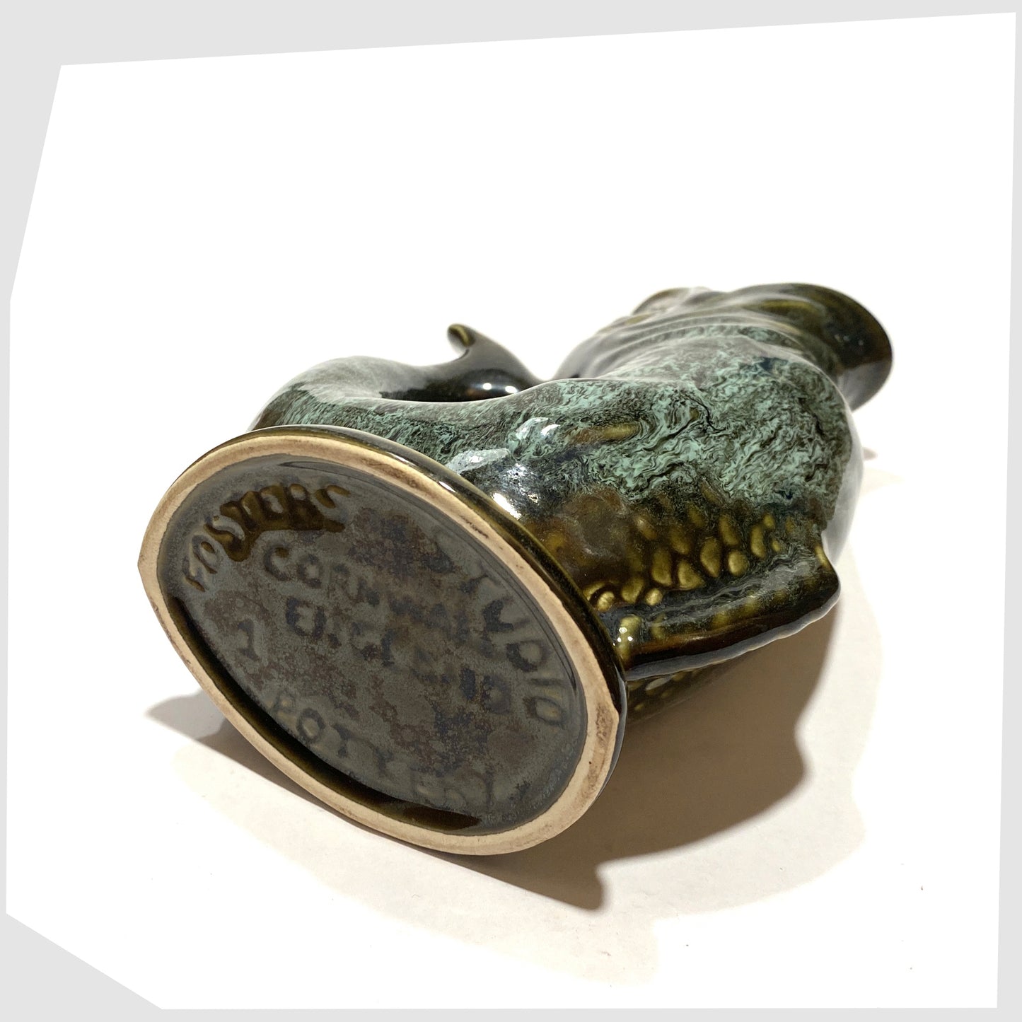 base of the vintage fosters studio pottery gluggle jug in green drip glaze