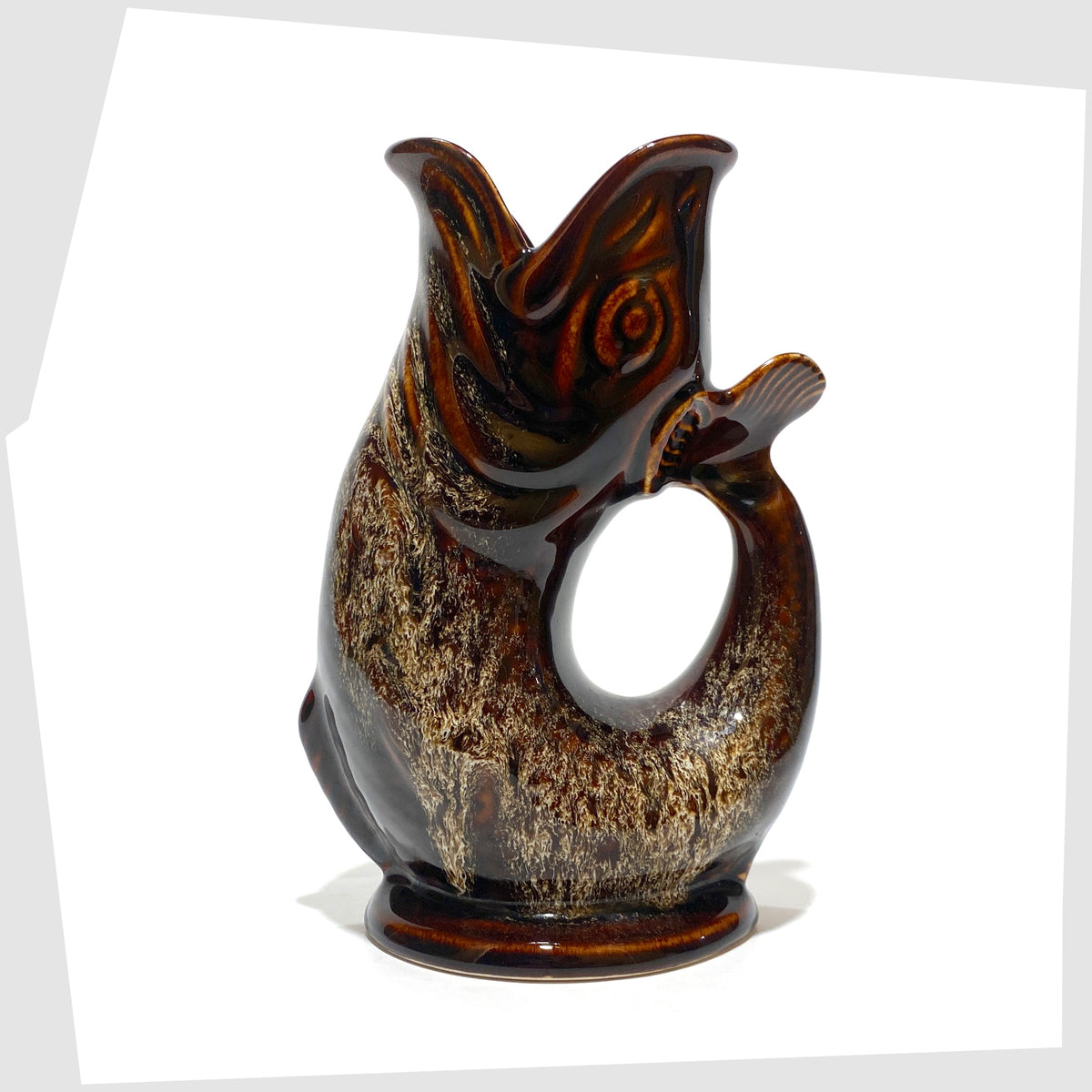 Vintage Fosters Studio Pottery Gluggle Jug in a chestnut brown with amber honeycomb drip glaze, shown on a white background