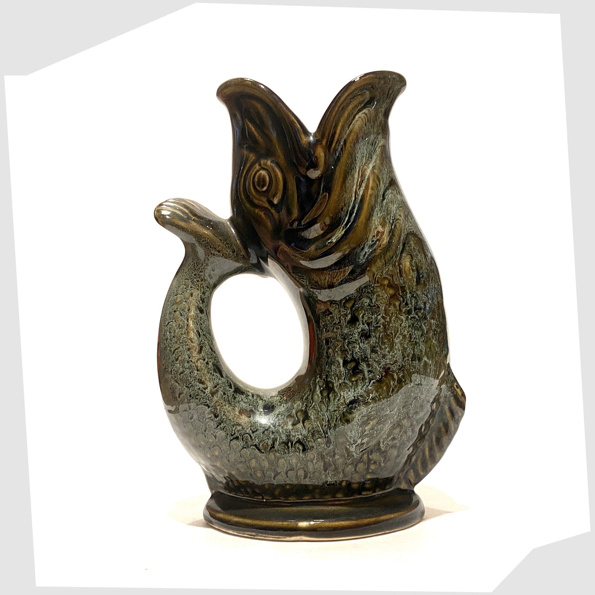 Fosters Studio Pottery Gluggle in Green honeycomb drip glaze, shown on a white background