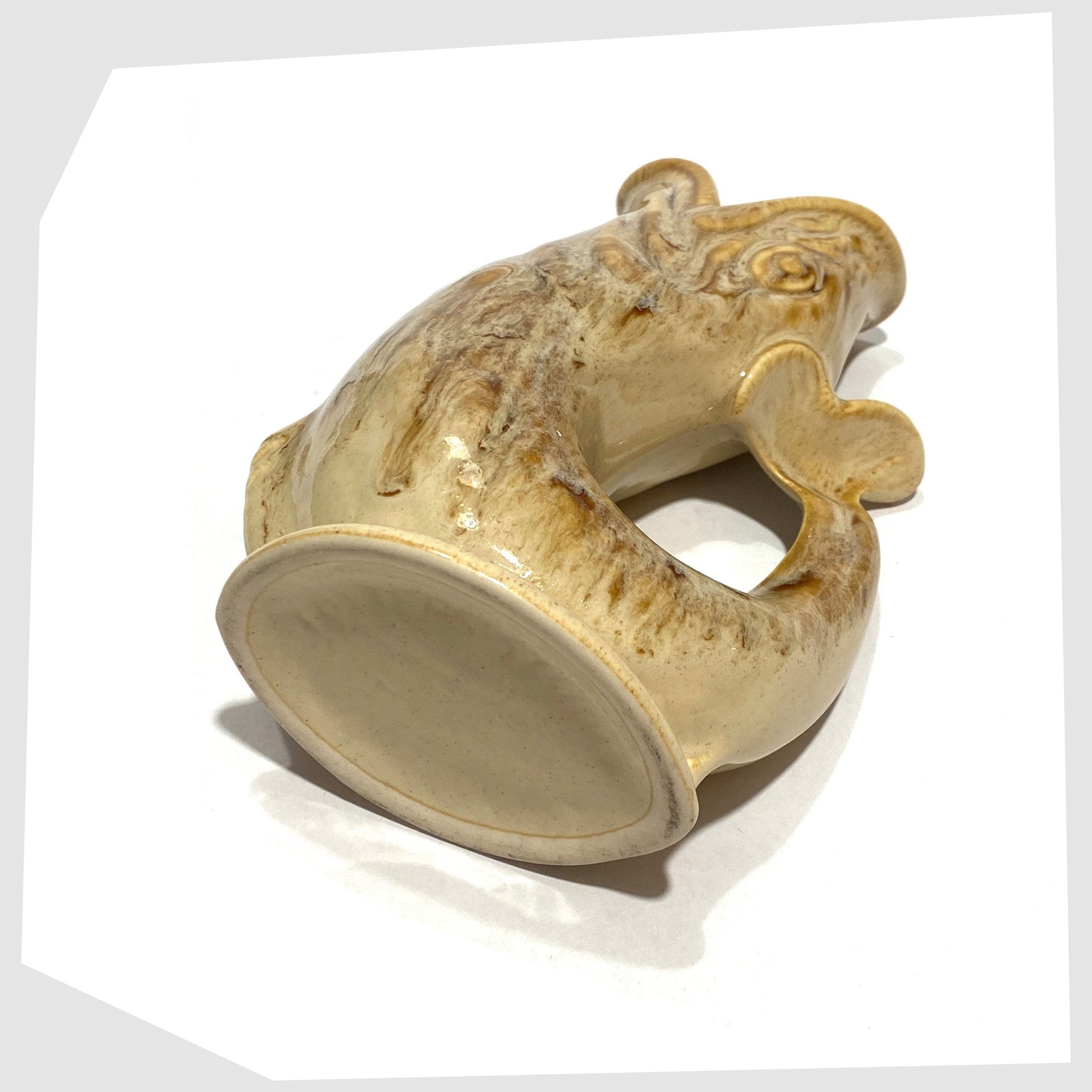 base stamp of the fosters studio pottery gluggle jug in cream and brown honeycomb glaze