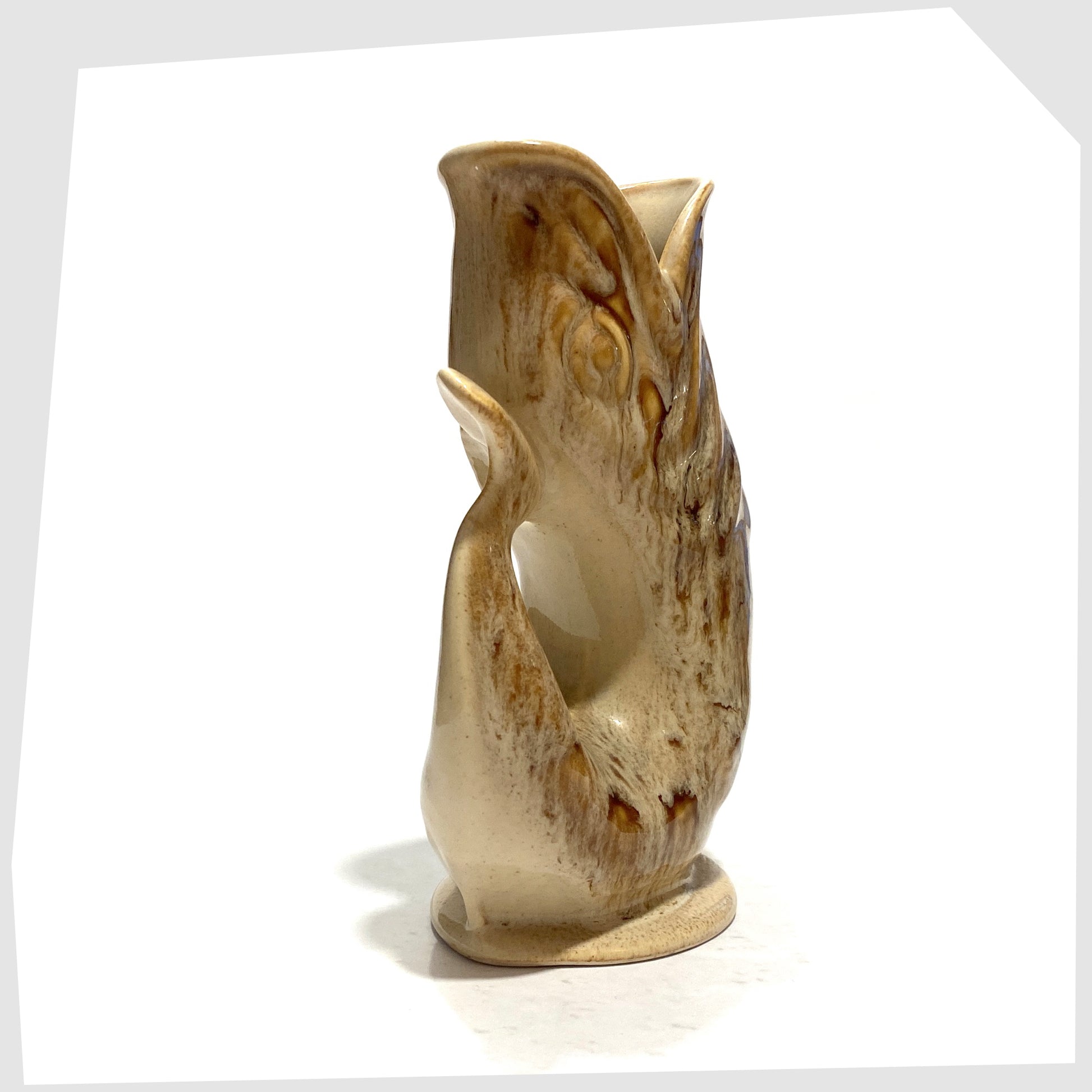tail of the honeycomb gluggle jug by fosters studio pottery, cornwall