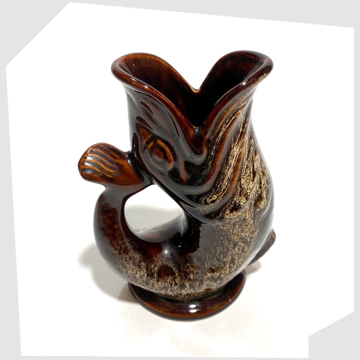 Top view of the Fosters Studio Pottery Gluggle Jug in a chestnut brown with amber drip glaze, shown on a white background