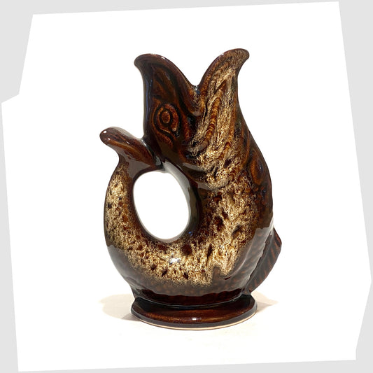 Fosters Studio Pottery Gluggle Jug in a chestnut brown with amber drip glaze, shown on a white background